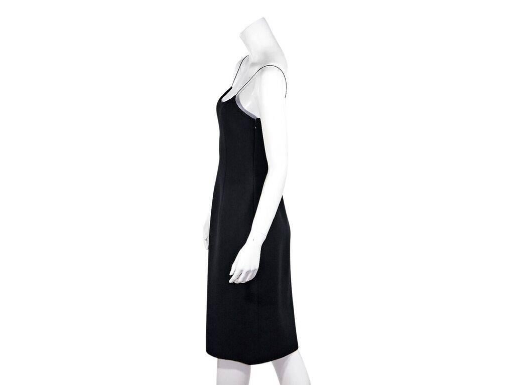 Product details:  Black sheath dress by Prada.  Scoopneck.  Sleeveless.  Concealed side zip closure.  Label size IT 44.  32