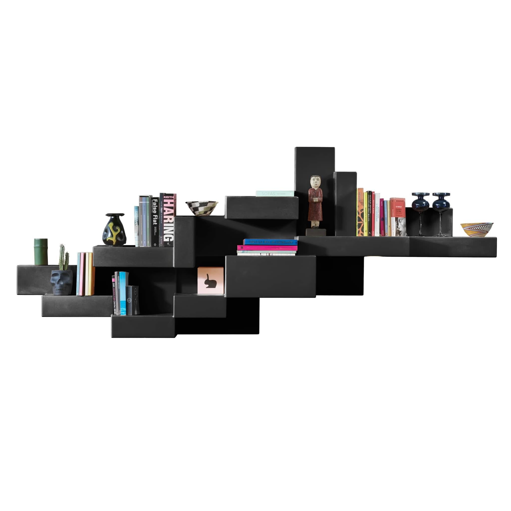 The Primitive bookshelf was one of the strongest and most iconic products designed by Studio Nucleo. Initially made as a limited-edition product, this bookshelf is now industrialized by Qeeboo and re-proposed in a polyethylene version with