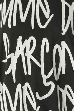 Black printed tee-shirt with stiff circle in the bottom edge Comm des Garçons