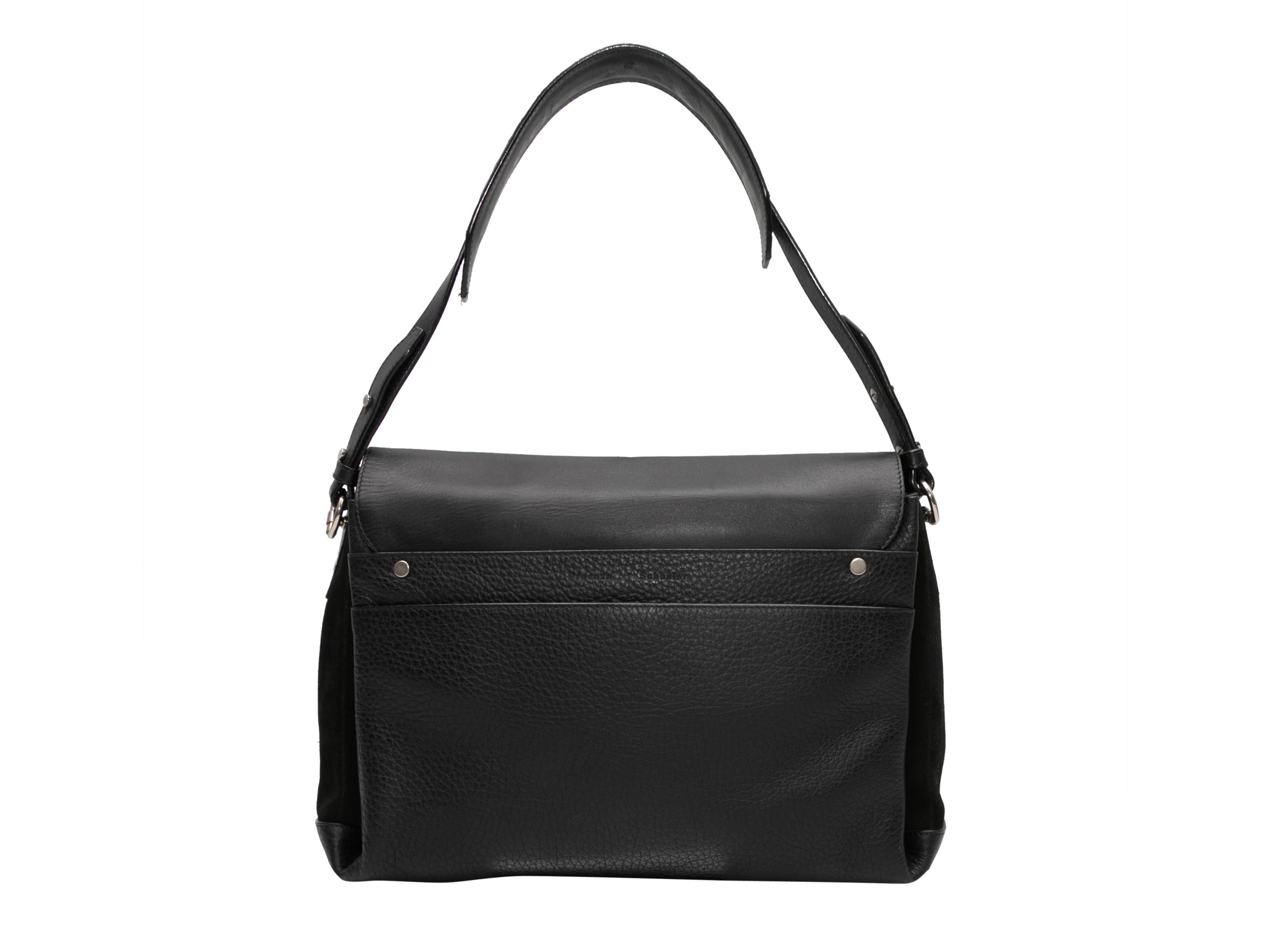 Black Proenza Schouler Leather Shoulder Bag. This shoulder bag features a leather body, silver-tone hardware, a single flat shoulder strap, and a front turn-lock flap closure. 13