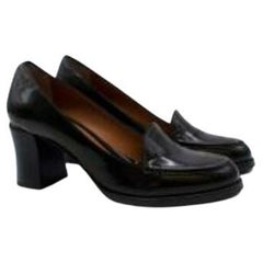 Black punched leather block heeled pumps