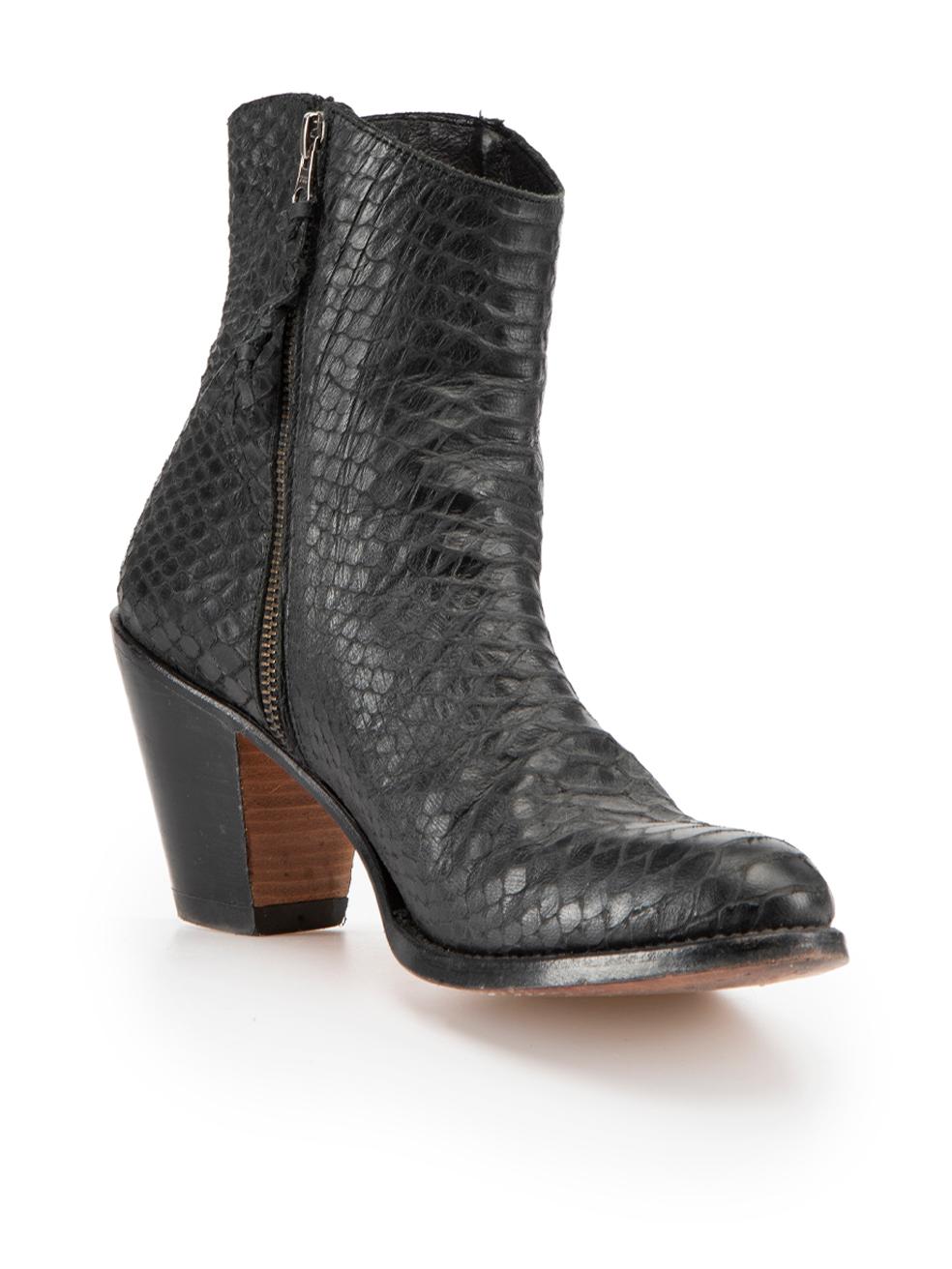 CONDITION is Very good. Minimal wear to boots is evident. Minimal wear to both heels with small scuff marks on this used Penelope Chilvers designer resale item.



Details


Black

Python leather

Ankle boots

Almond toe

High heeled

Cuban