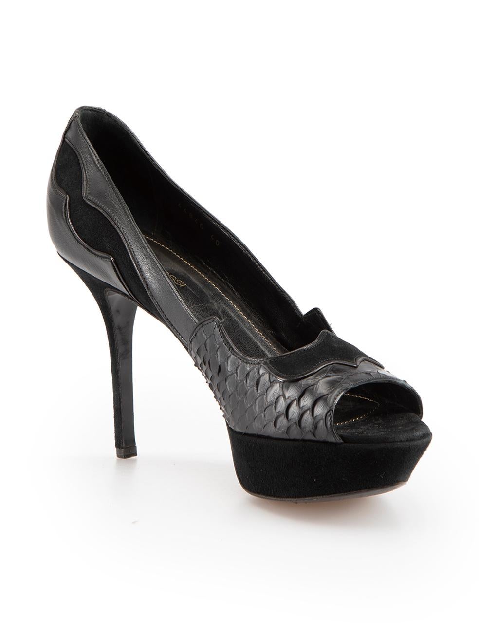 CONDITION is Good. Minor wear to shoes is evident. Light wear to both heel-stems with scuff marks and the right-shoe front trim has come away this used Sergio Rossi designer resale item.



Details


Black

Leather

Slip-on heels

Python, suede and