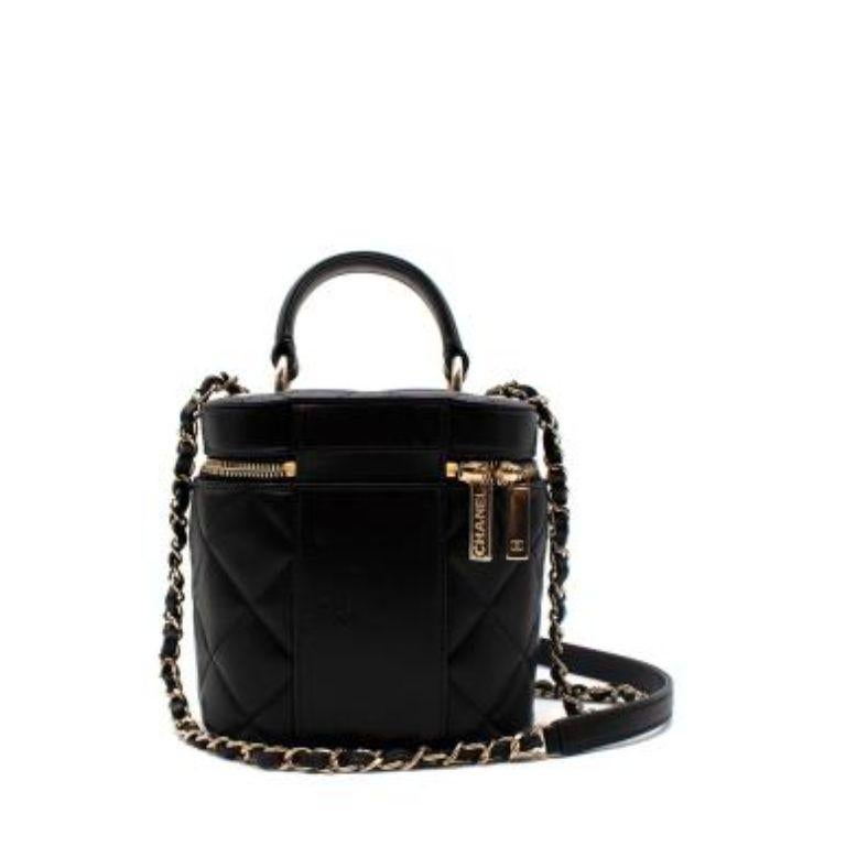 Chanel Black Quilted Leather Trendy CC Vanity Bag 
 

 - Gold tone interlocking CC logo 
 - Gold tone metallic hardware 
 - Rolled leather top handle 
 - Chain and leather woven shoulder strap 
 - Signature diamond stitched quilted pattern 
 - One