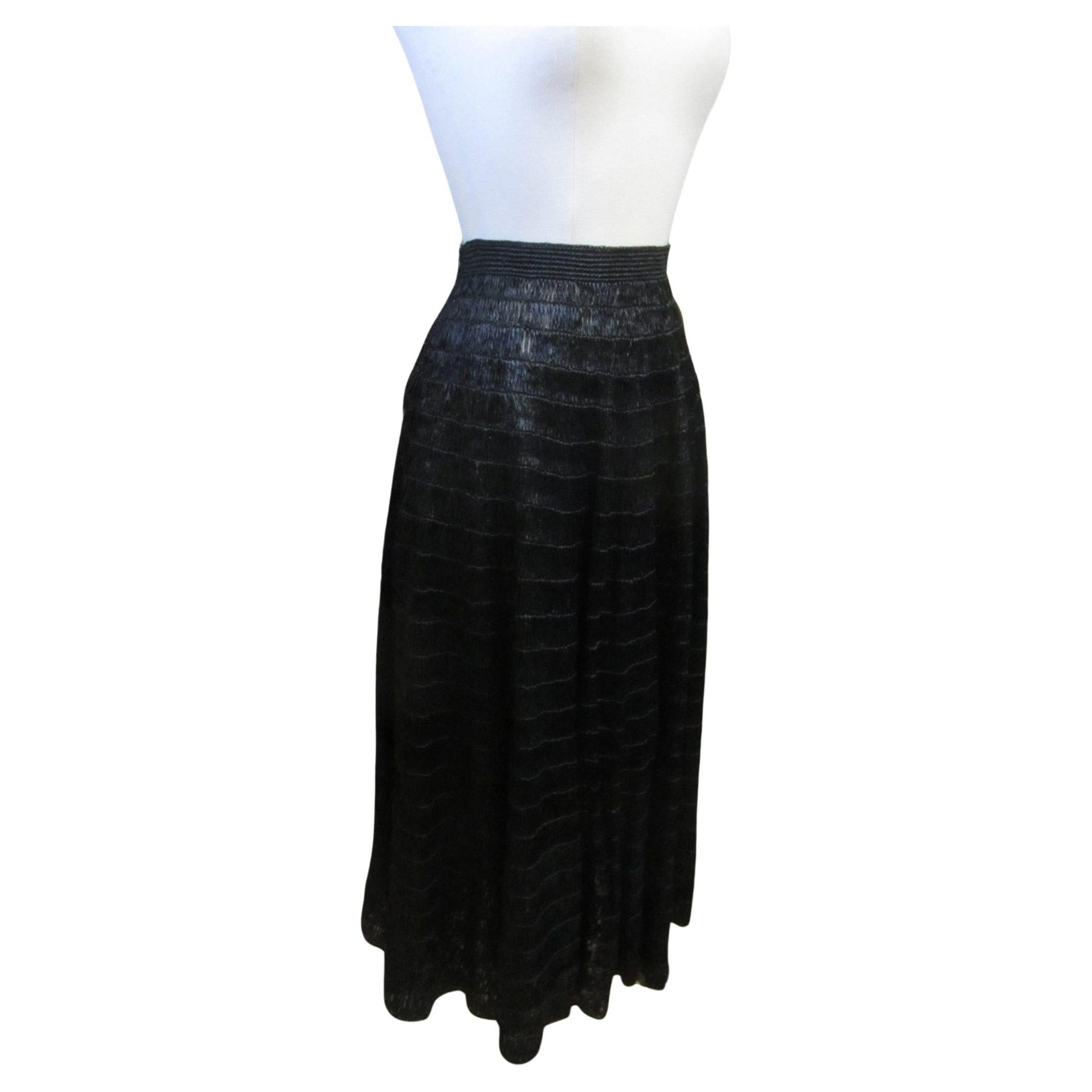 Falda vintage de rafia negra. cintura entallada. falda completa. tejida a mano. cierre lateral con cremallera metálica.

Alrededor de 1950
Sin etiqueta
Material - Rafia
Negro
Excelente estado

✂----M e d i d a d e s: todo en pulgadas.

⦿ Cintura: