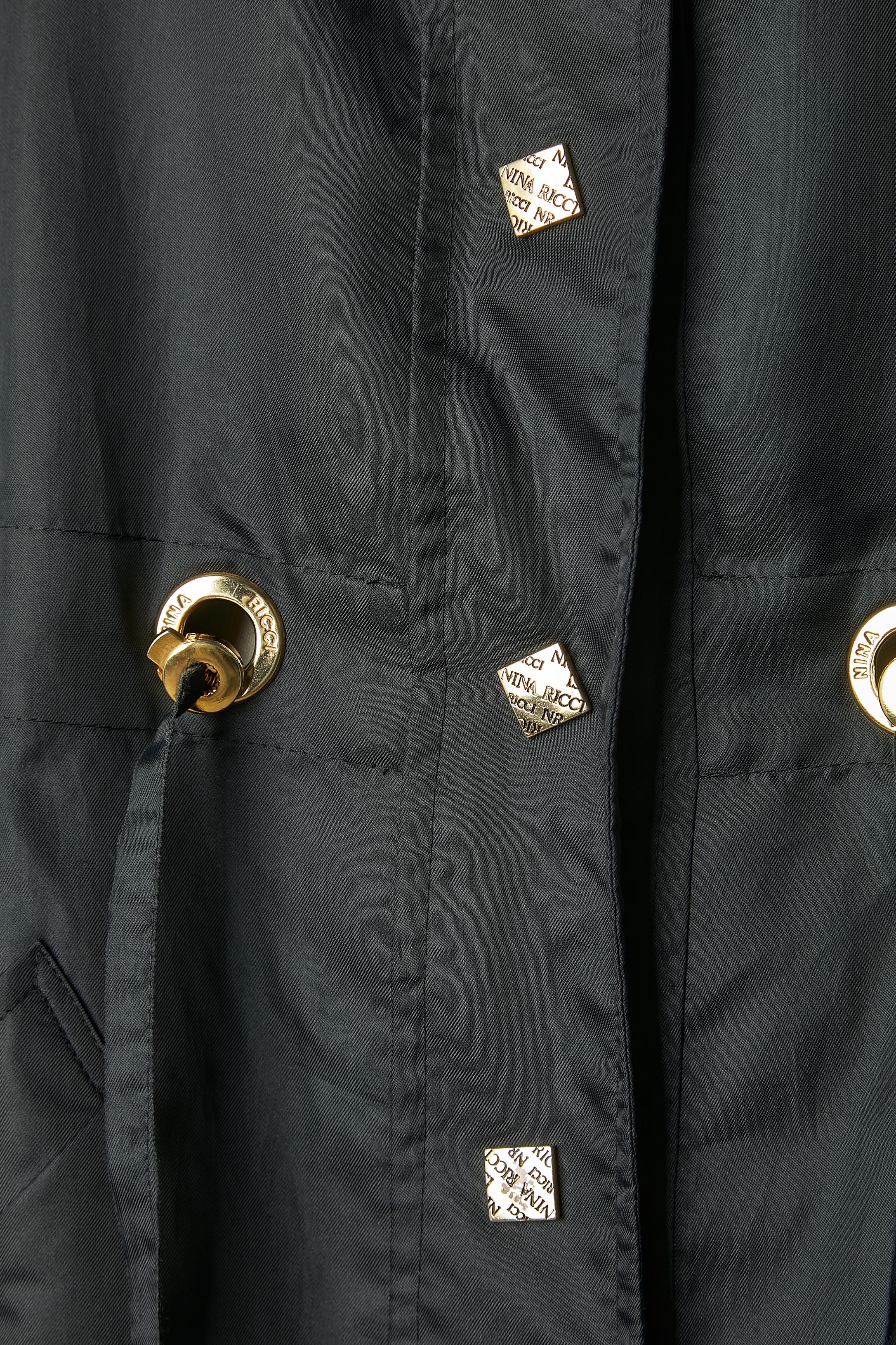 Black raincoat with branded snap and gold metal eyelet Nina Ricci  In Excellent Condition For Sale In Saint-Ouen-Sur-Seine, FR