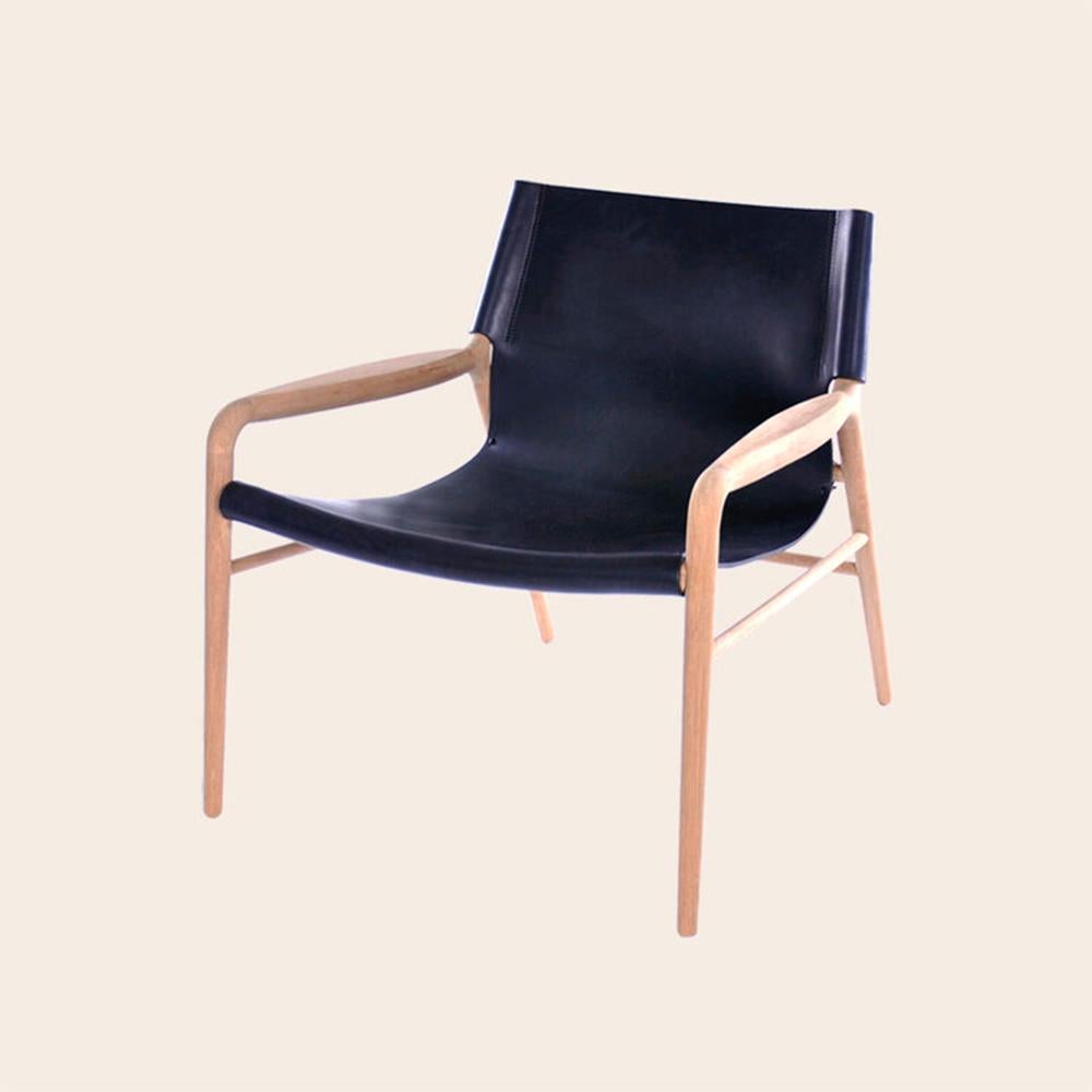 Black Rama Oak chair by OxDenmarq
Dimensions: D 72 x W 68 x H 70 cm
Materials: Leather, Wood
Also Available: Different colors available.

OX DENMARQ is a Danish design brand aspiring to make beautiful handmade furniture, accessories and
