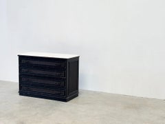 Black rattan cabinet with marble top
