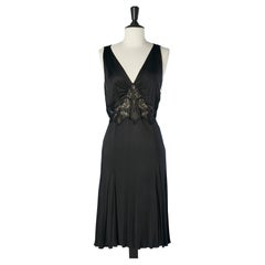Black rayon cocktail dress with black see-through lace on the waist Versace 