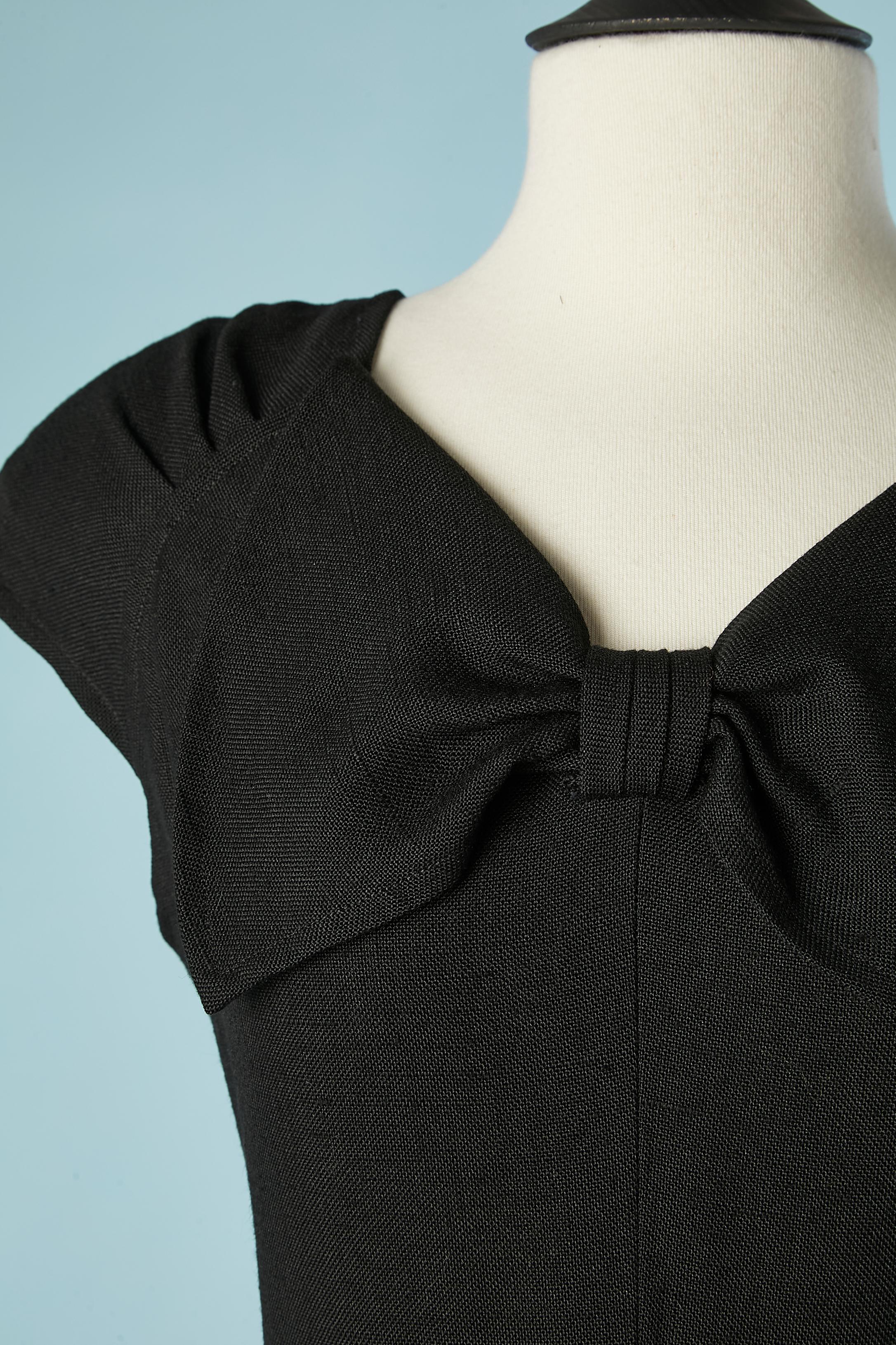 Black rayon cocktail dress with bow and bow on pockets. Acetate lining. Buttons and buttonhole in the middle back.Draped on shoulders and shoulder-pad. 
Size 38 / M 
