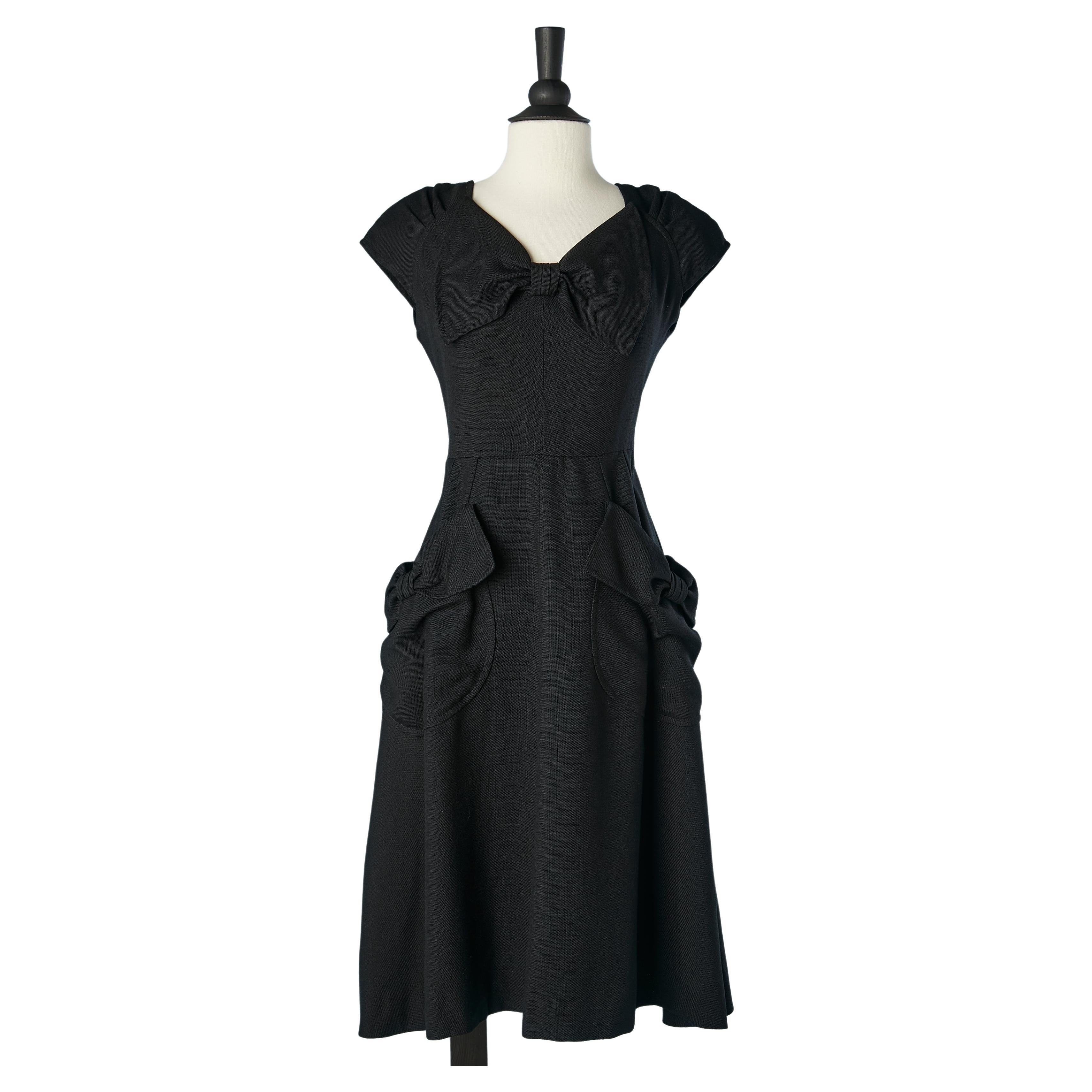 Black rayon cocktail dress with bow and bow on pockets Nina Ricci Boutique  For Sale