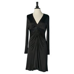 Black rayon jersey cocktail dress draped on the front VERSACE