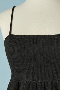 Black rayon knit slip dress with branded buttons on the back CHANEL Boutique