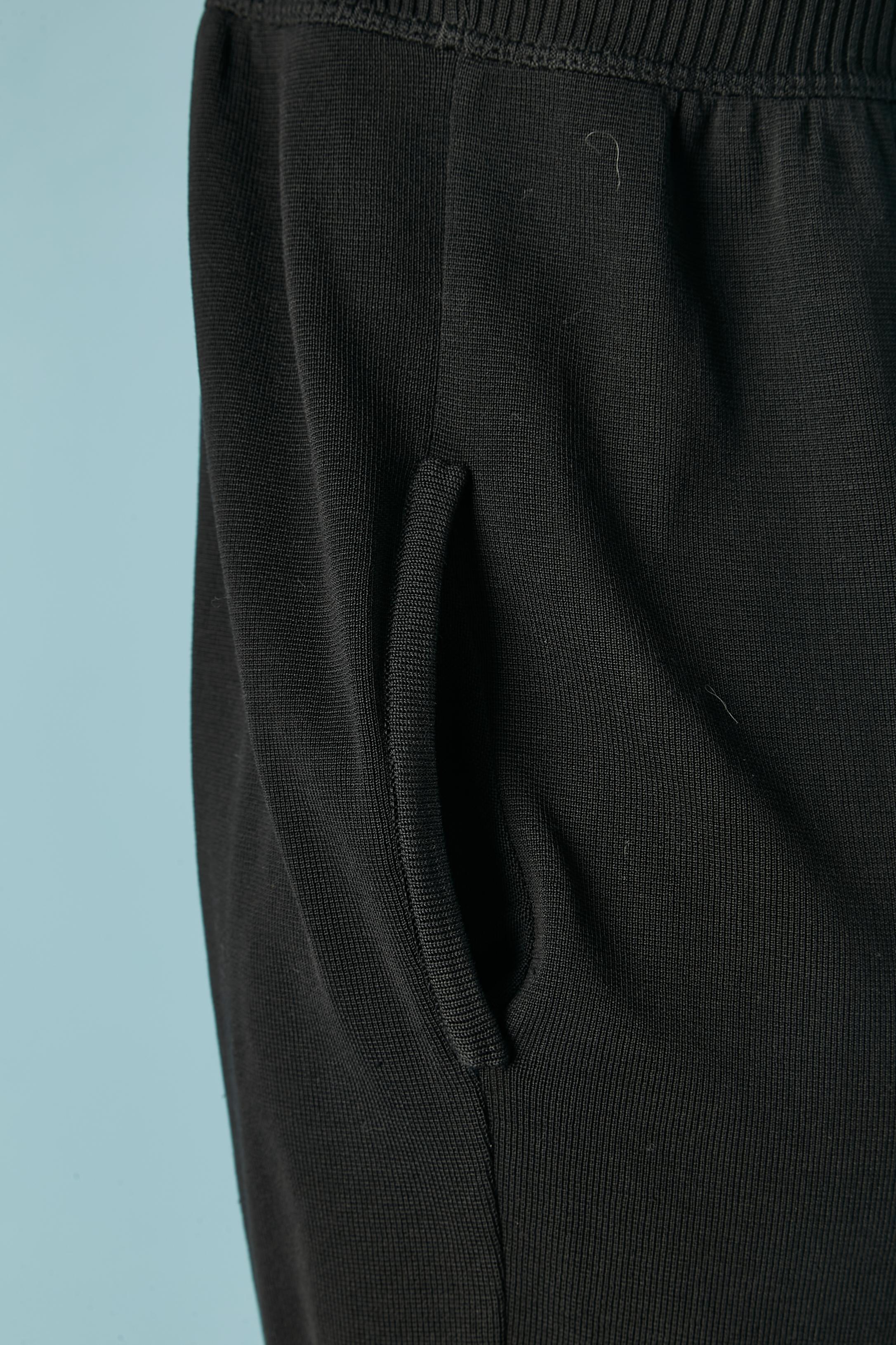 Black rayon knit slip dress with branded buttons on the back CHANEL Boutique For Sale 1