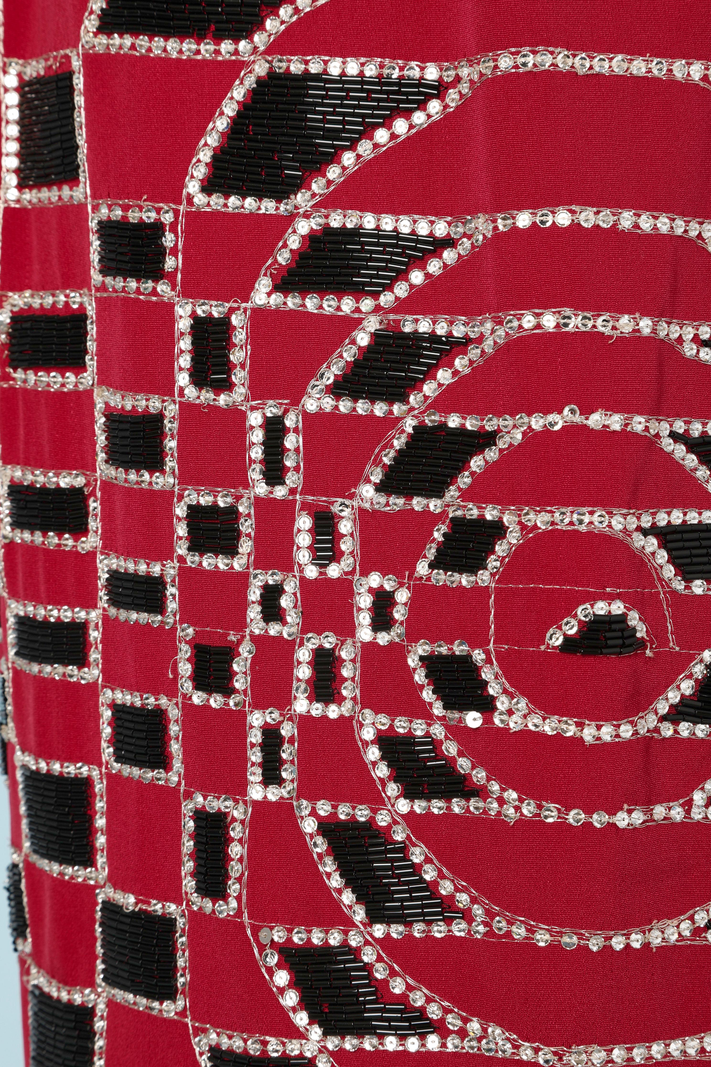 Pencil skirt covered black glass beads and silver sequences on red silk base 