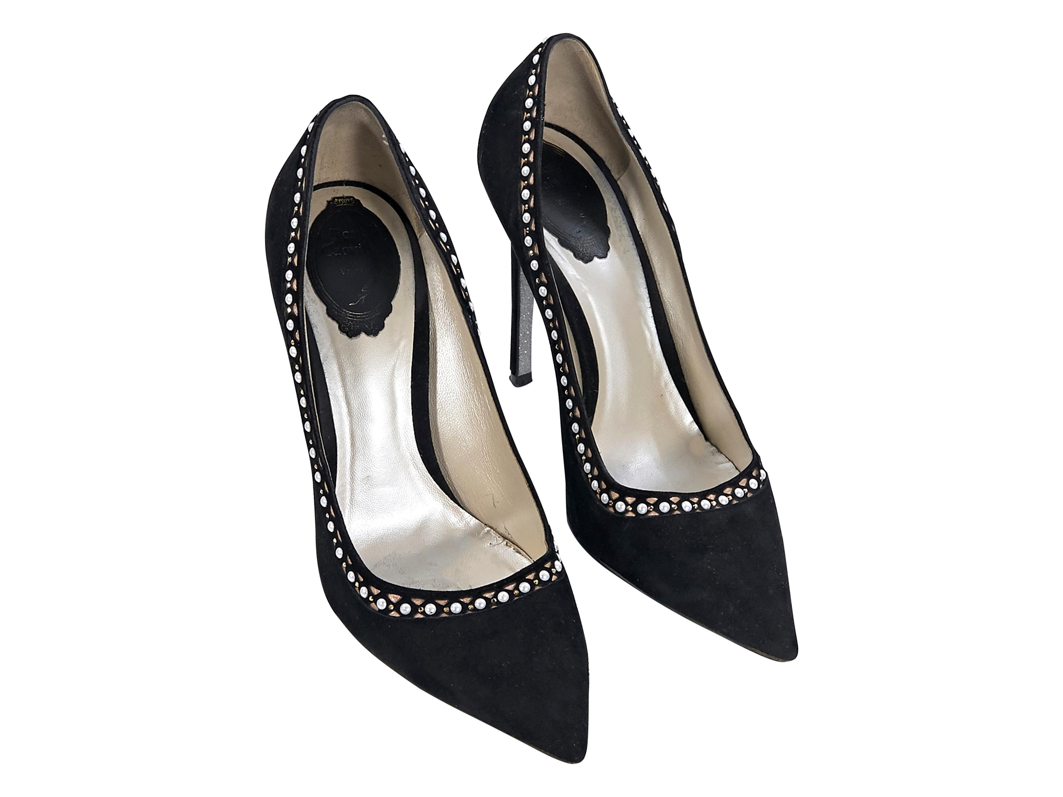 Product details:  Black suede pumps by Rene Caovilla.  Embellished trim.  Point toe.  Slip-on style.  4