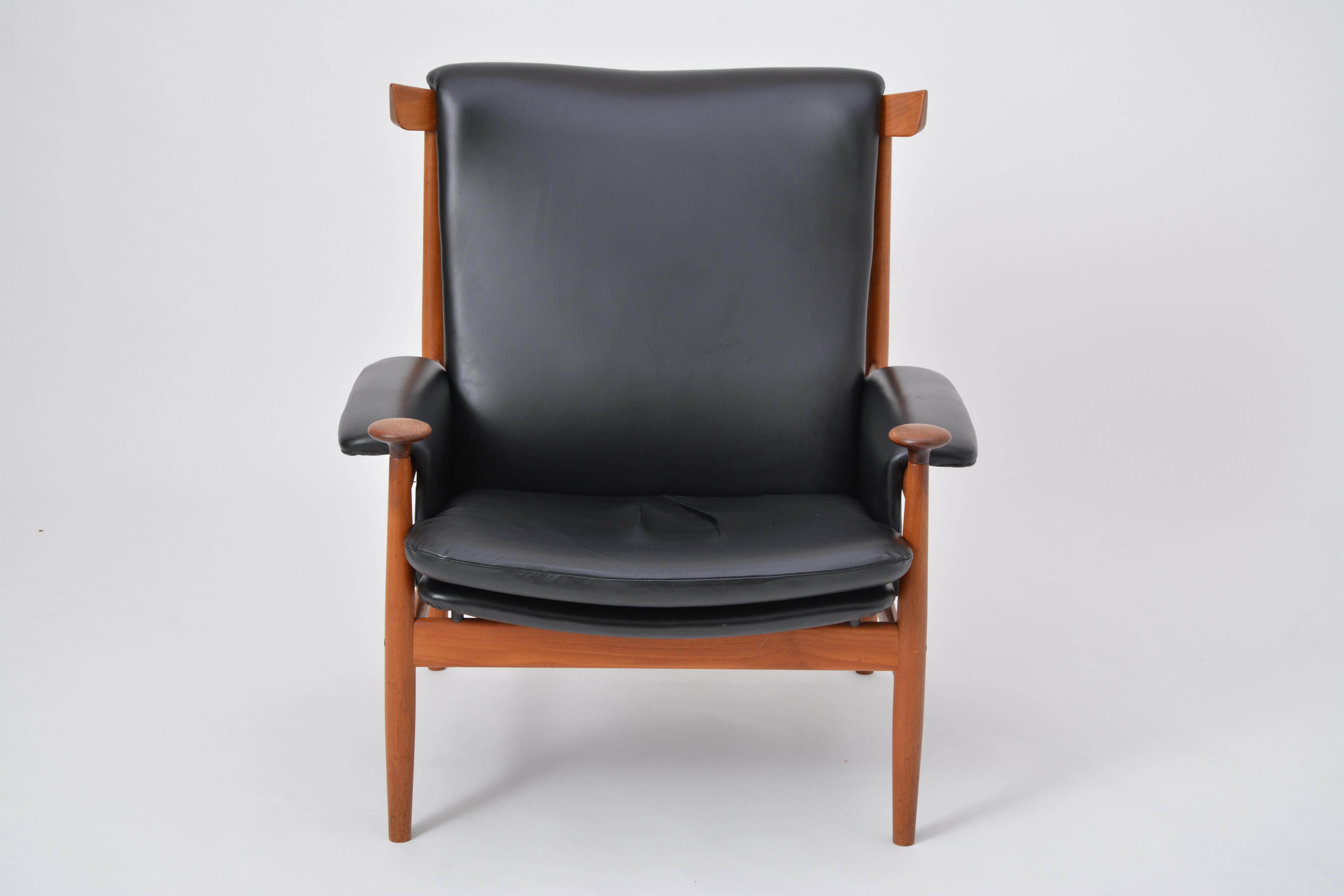 'Bwana' chair by Finn Juhl for France & Sons in teak wood and reupholstered in black leather. Very good vintage condition. The 