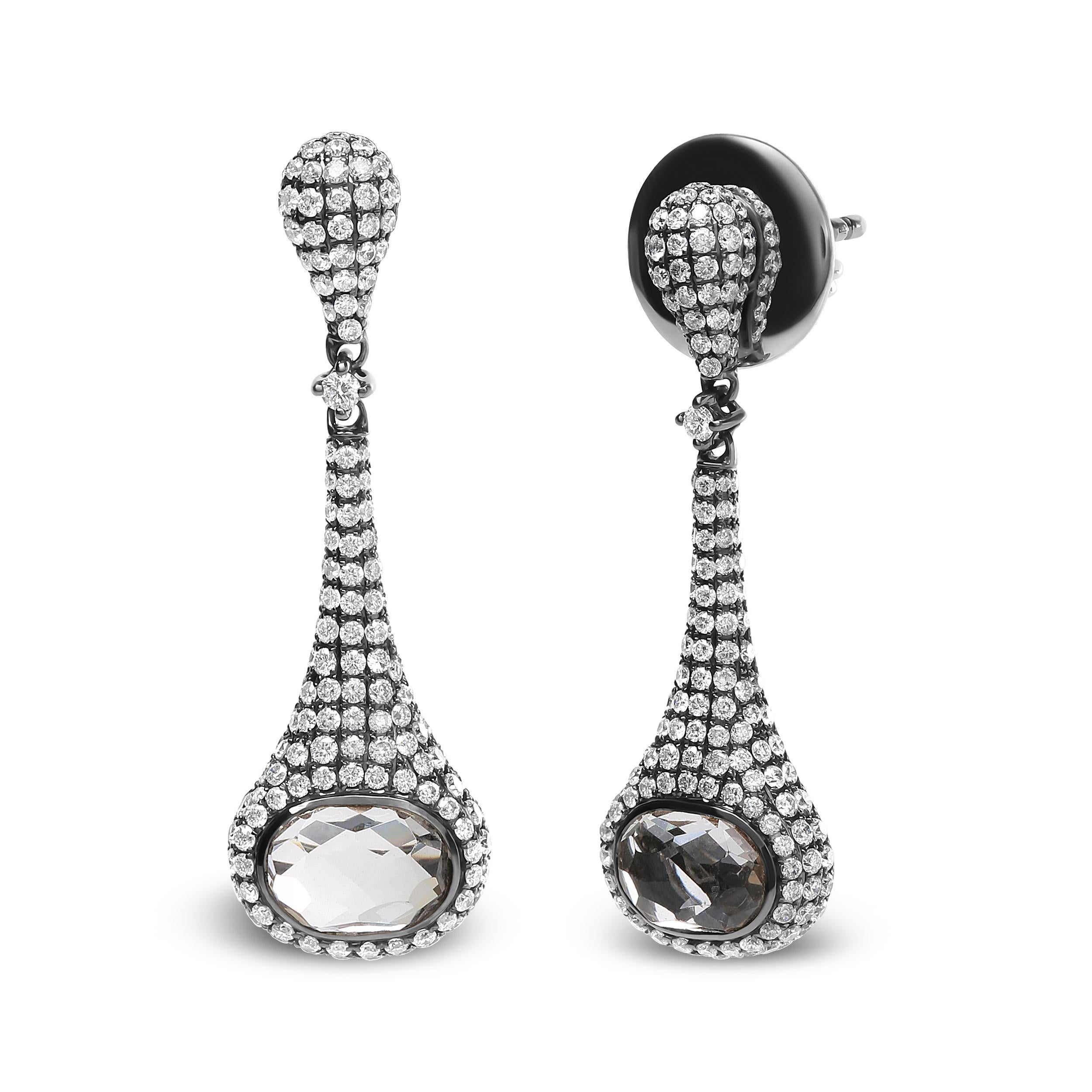 Dramatically glamorous, these dangle drop earrings make a magical accessory for your eveningwear attire or anytime you wish to make a statement. Made from black rhodium plated 18k white gold, this pair stuns in 346 total diamonds set carefully