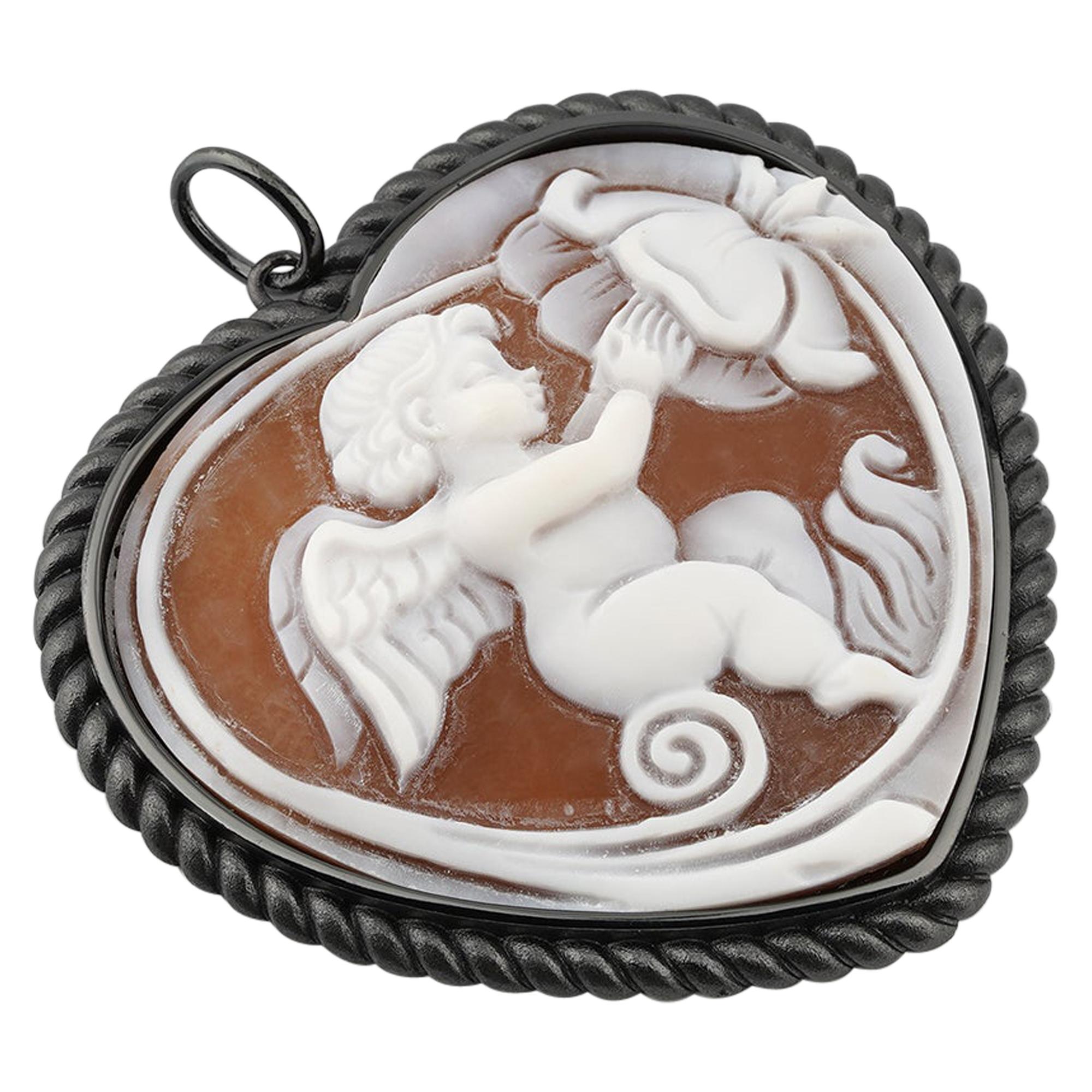 Cameo Italiano. The Cupid hand-carved on Sea shell cameo, heart pendant. For Sale