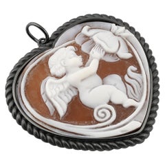 Cameo Italiano. The Cupid hand-carved on Sea shell cameo, heart pendant.