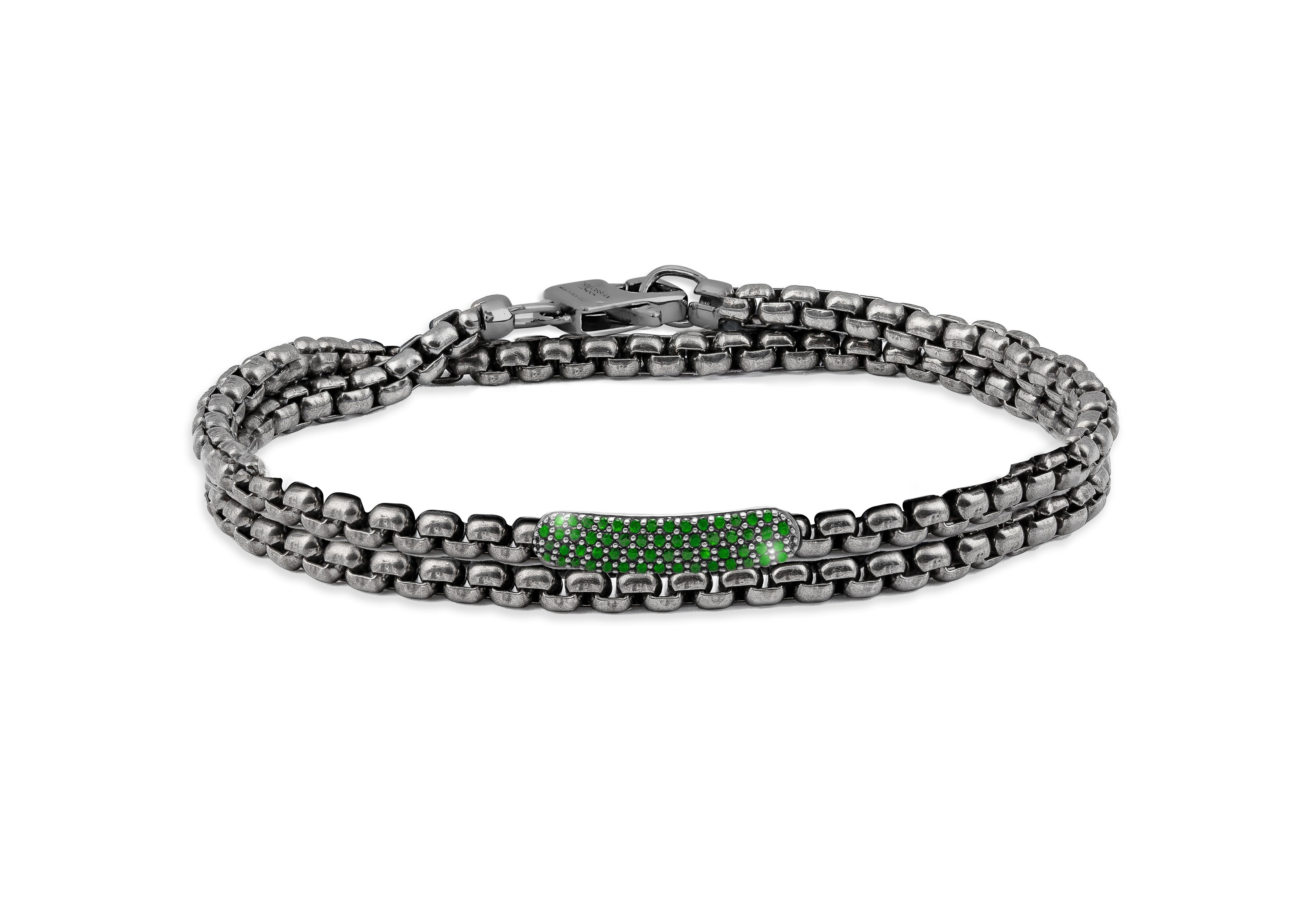 Black Rhodium Plated Sterling Silver Catena Baton Bracelet with Emeralds, Size L

The bracelets are handcrafted using carefully selected rare stones and feature a 0.34cts of black rhodium-plated sterling silver baton with sparkling green emeralds