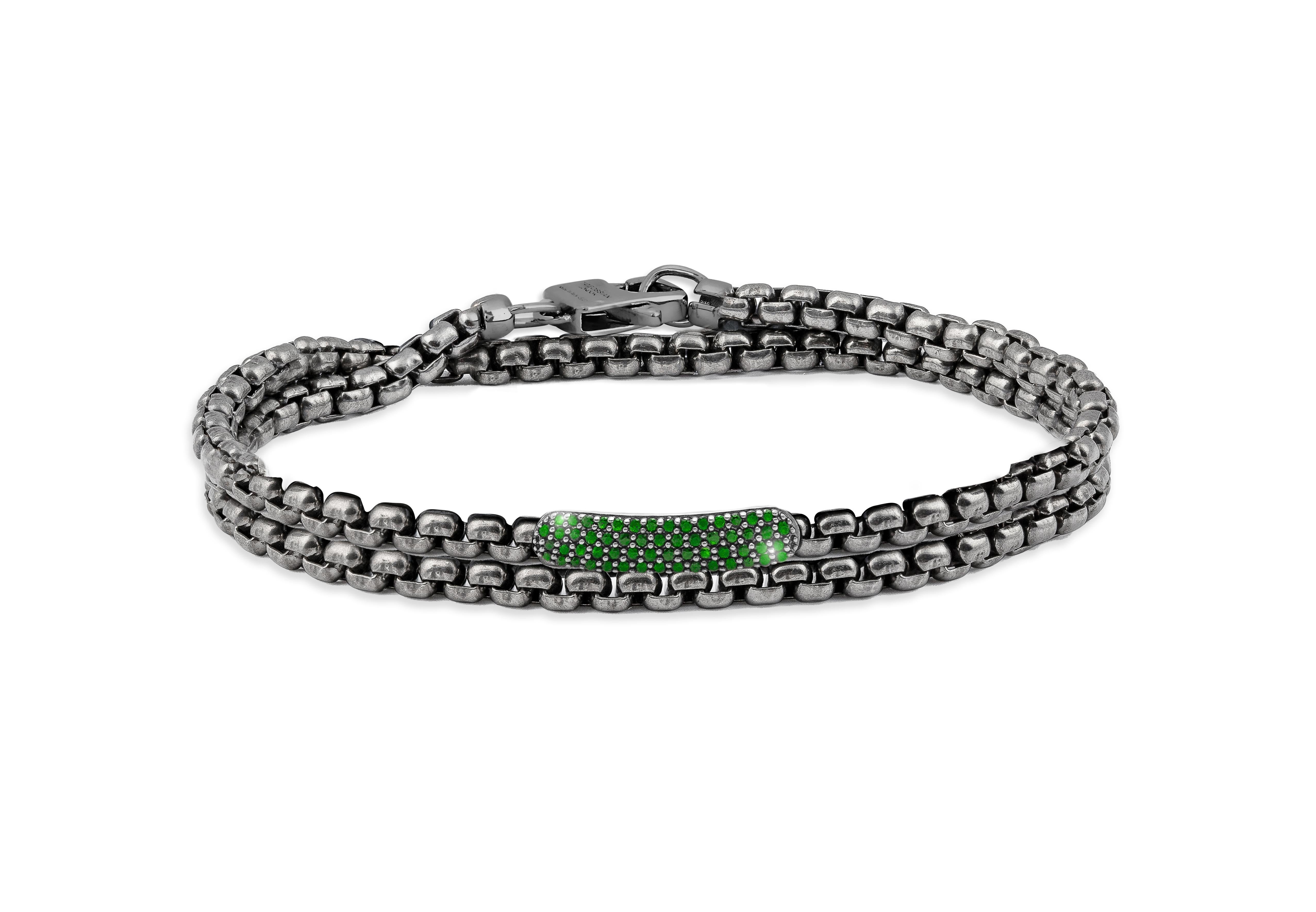 Black Rhodium Plated Sterling Silver Catena Baton Bracelet with Emeralds, Size M

The bracelets are handcrafted using carefully selected rare stones and feature a 0.34cts of black rhodium-plated sterling silver baton with sparkling green emeralds