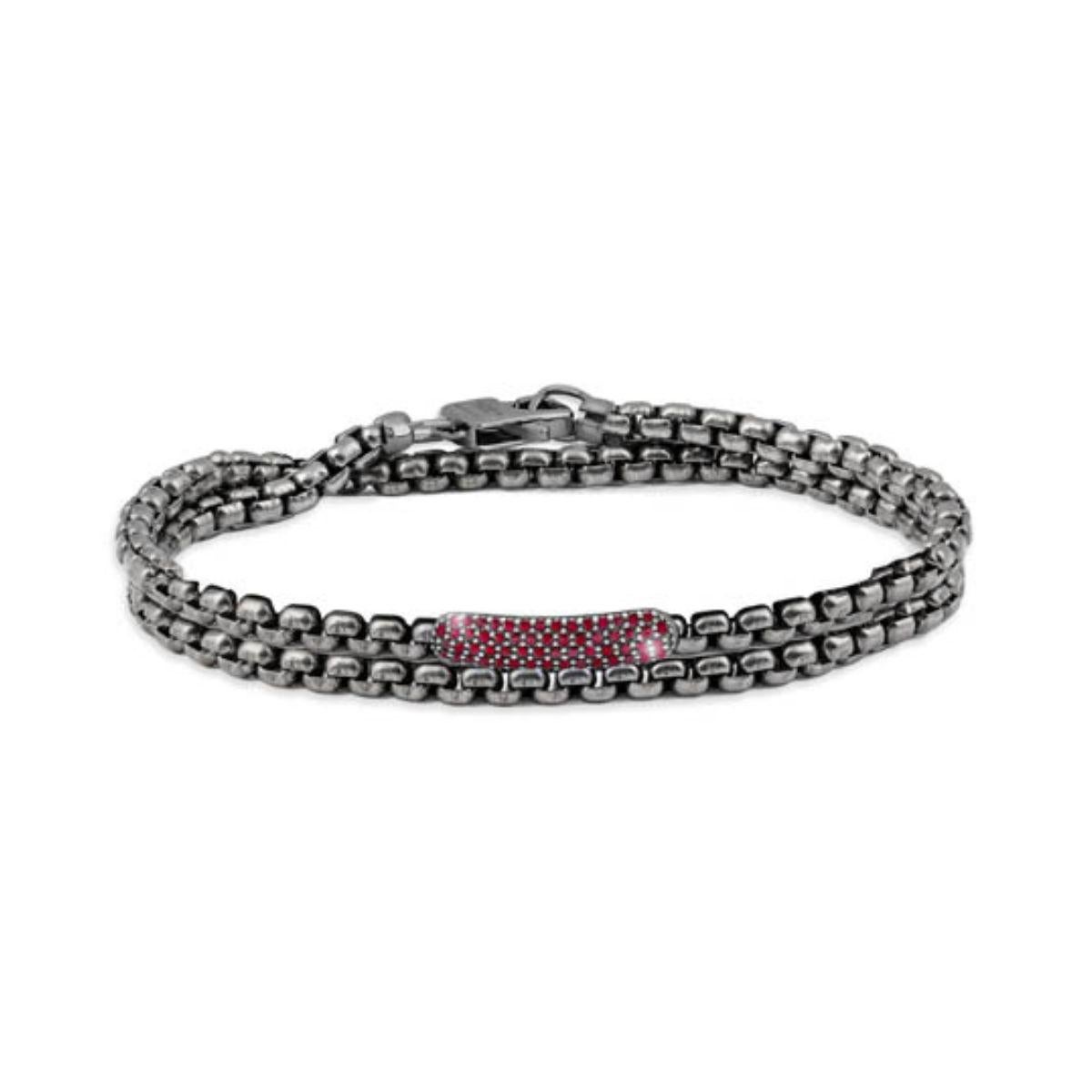 Black Rhodium Plated Sterling Silver Catena Baton Bracelet with Rubies, Size M

The bracelets are handcrafted using carefully selected rare stones and feature a black rhodium-plated sterling silver baton with 0.45cts of sparkling red rubies arranged