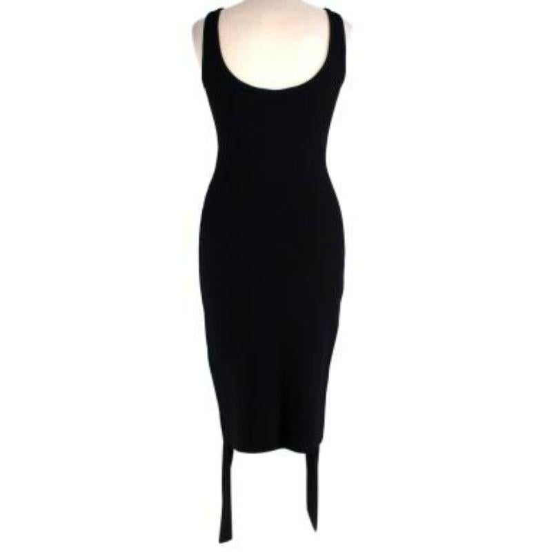 Givenchy Black Ribbed Scoop Sleeveless Dress
 
 
 
 -Scoop neck 
 
 -Ribbed edges 
 
 -Inverted scoop hem 
 
 -Mid weight with slight stretch 
 
 -Slip-on style 
 
 -Body con fitted 
 
 
 
 Material: 
 
 
 
 91% Viscose 
 
 4% Polyester 
 
 3%