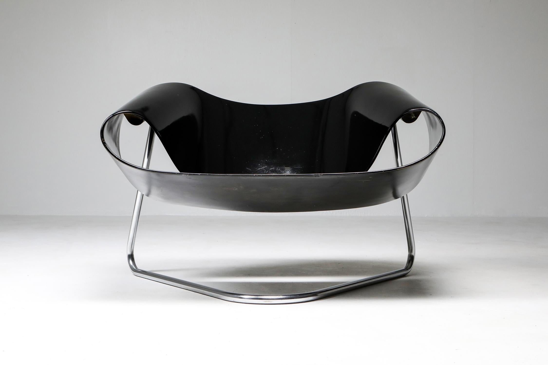 Franca Stagi, CL9 ribbon chair, black, Bernini, Italy circa 1961 

Moulded fibreglass seating section on chrome tubular base. 

Gorgeous high-end piece by a female designer, in original condition.
  

The ribbon is a symbol of awareness and