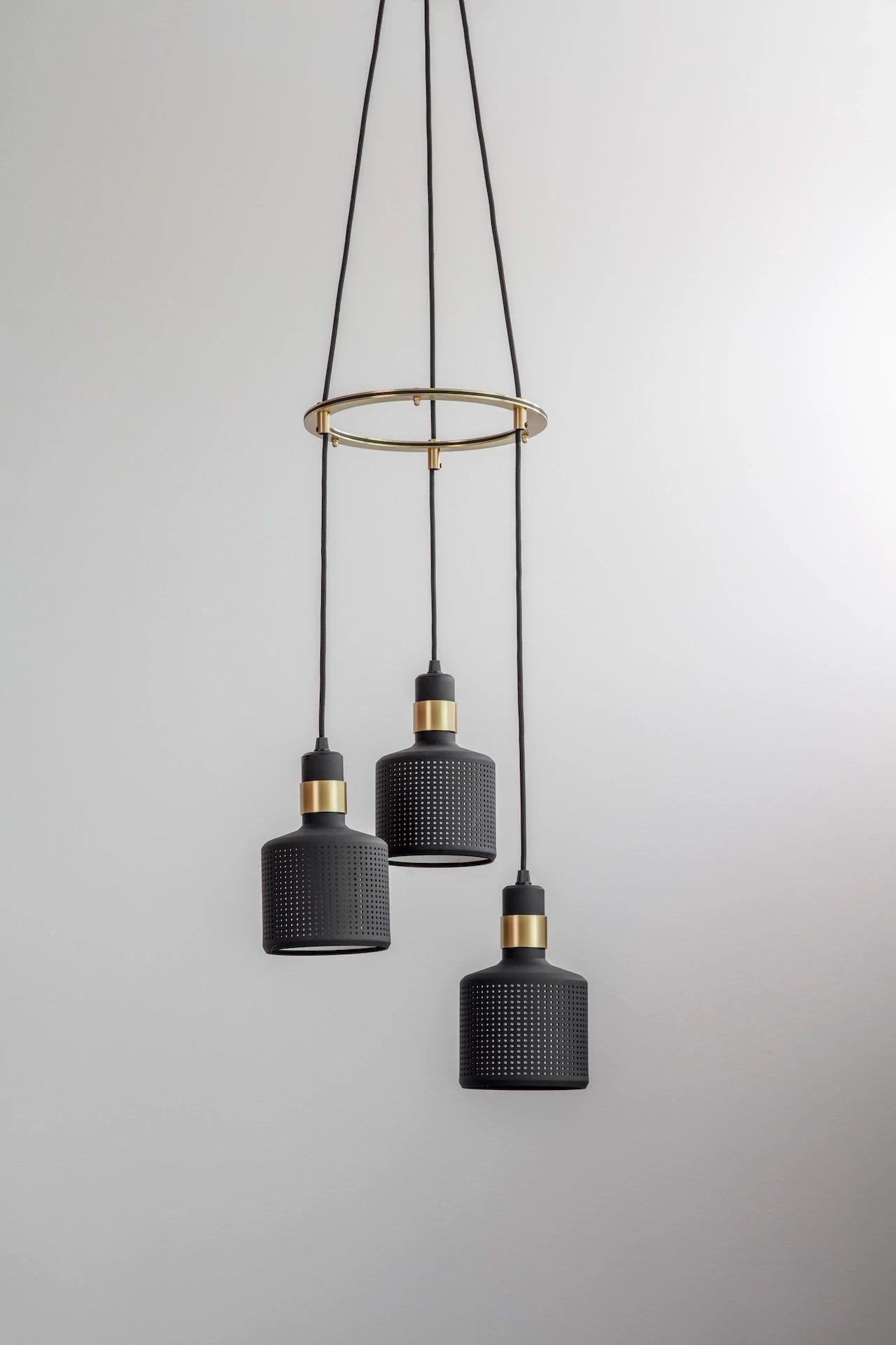 Black riddle cluster light 3 by Bert Frank
Dimensions: H 20 x W 12 x D 12 cm
Materials: brass and steel

Available finishes: brass and black
All our lamps can be wired according to each country. If sold to the USA it will be wired for the USA