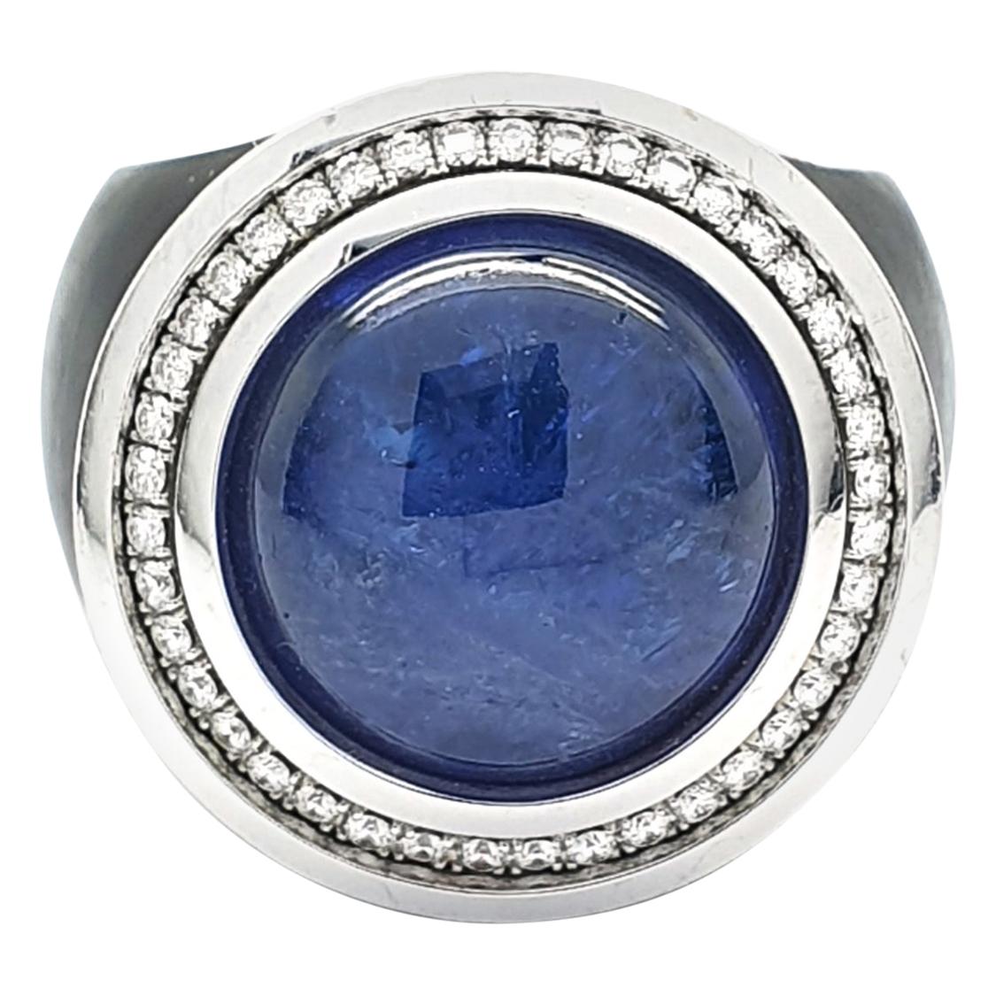 Black Ring with a Cabochon Tanzanite of 12.08 Carat and 36 H&A cut Diamonds For Sale