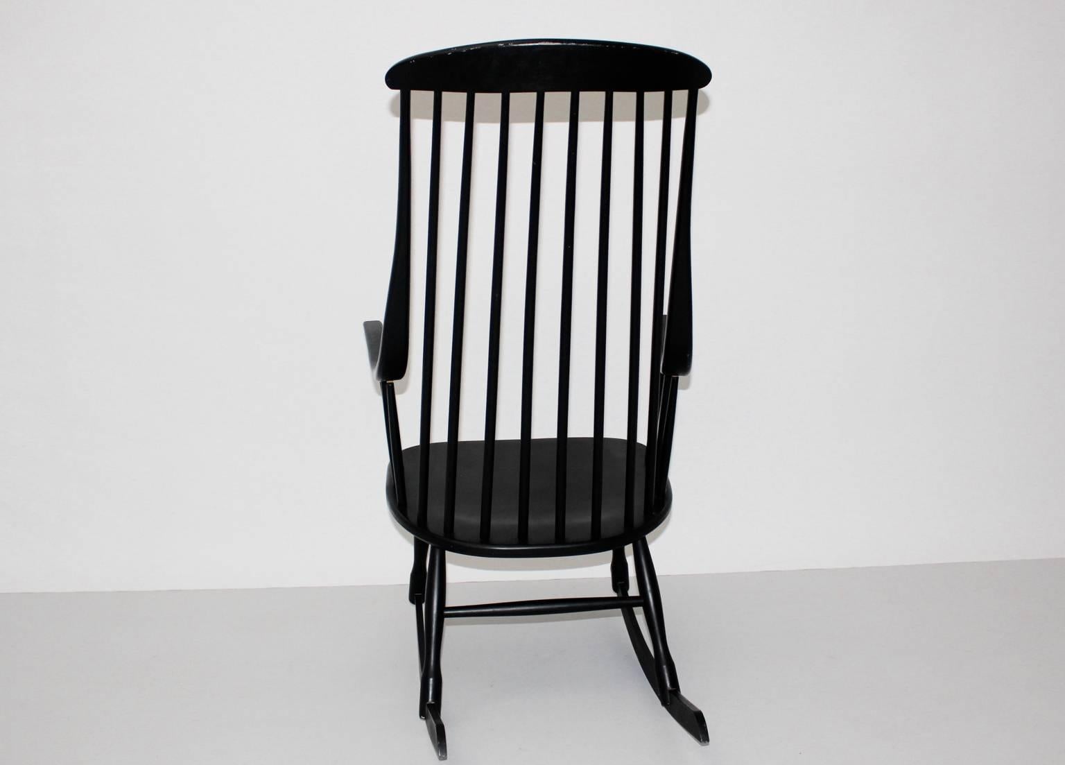 black wooden rocking chair