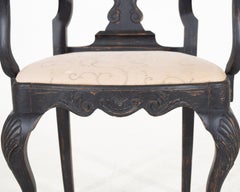 Black Rococo armchair, 18th C.