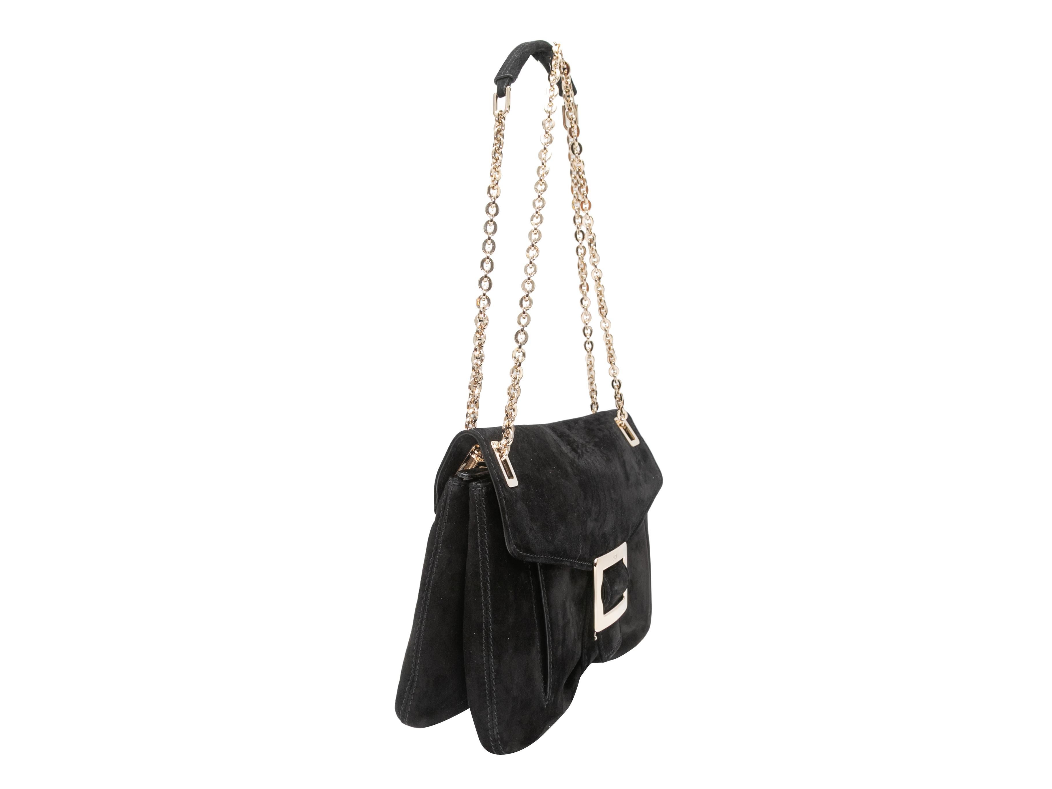 Black Roger Vivier Suede Shoulder Bag. This shoulder bag features a suede body, gold-tone hardware, a single chain-link and suede shoulder strap, and a front flap closure. 12.75