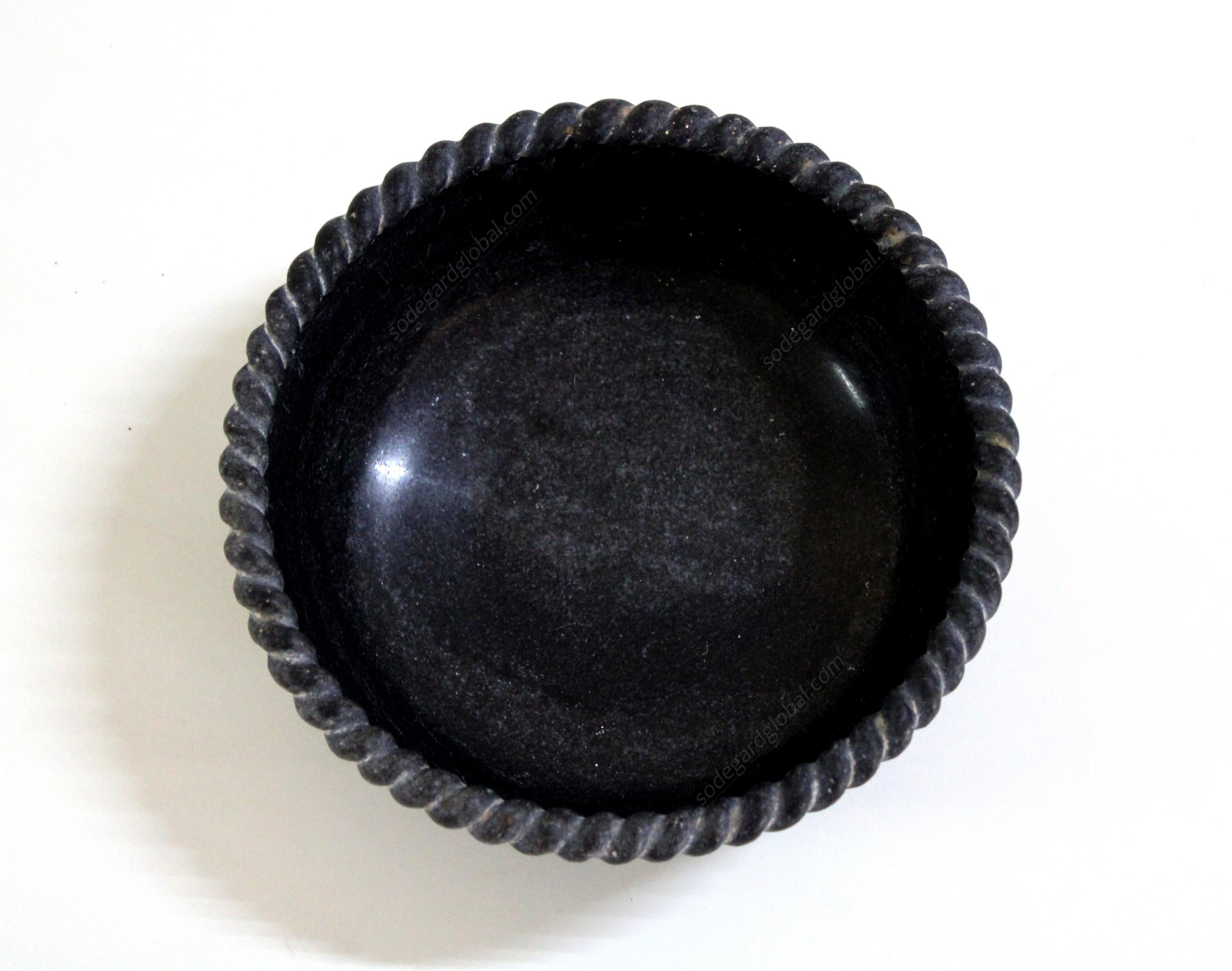 Sculpted out of a single block of marble with a delicately carved rope edge, perfect for a potpourri, a fruit bowl or just a key catch.


Round Rope Bowl in Black Marble
Size- 8.5” x 8.5” x 3.5” H.
Materials - Black Marble, Hand-Carved


Buyer