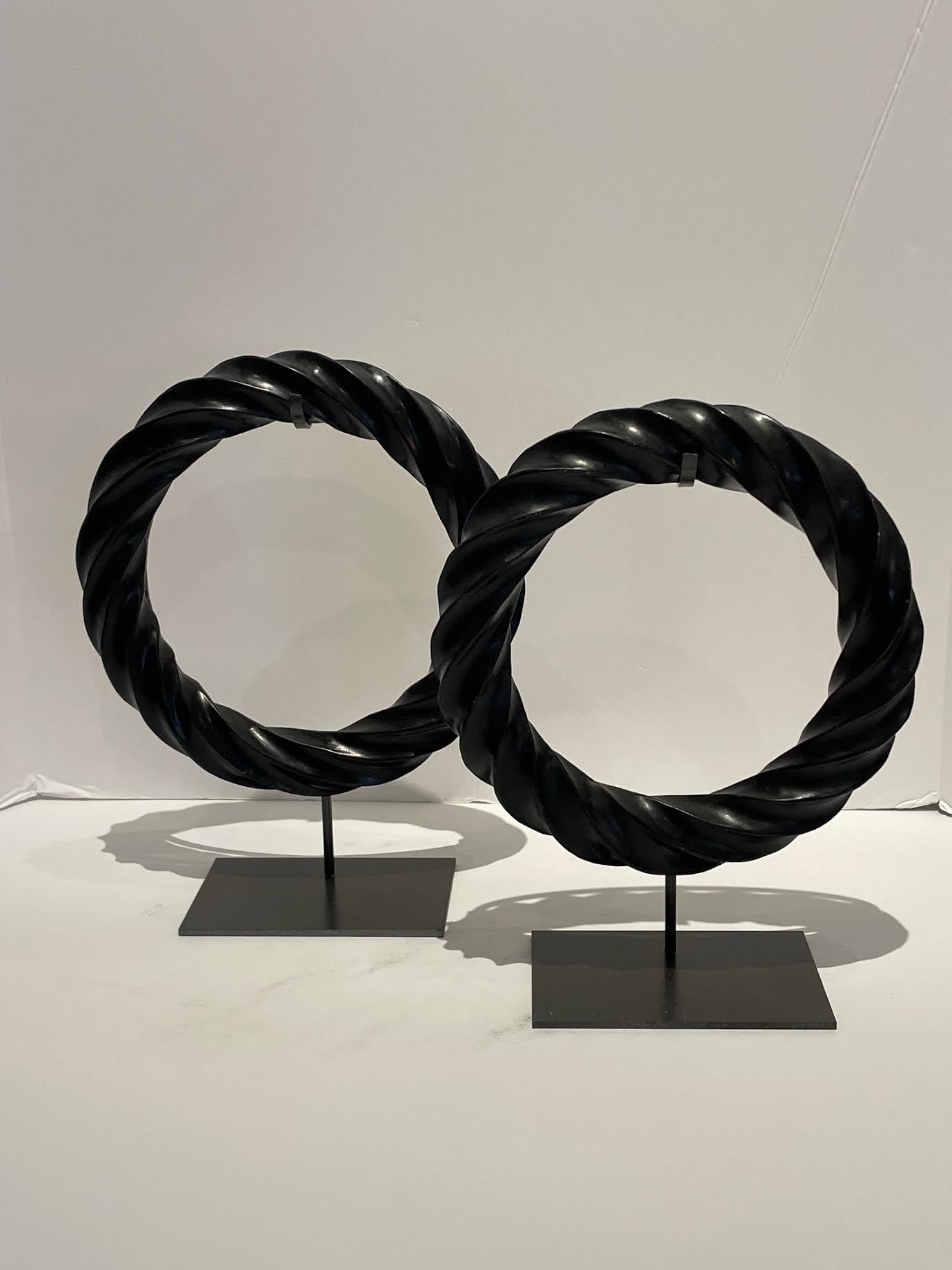 Chinese Black Rope Stone Set Of Two Rings On Stands, China, Contemporary For Sale