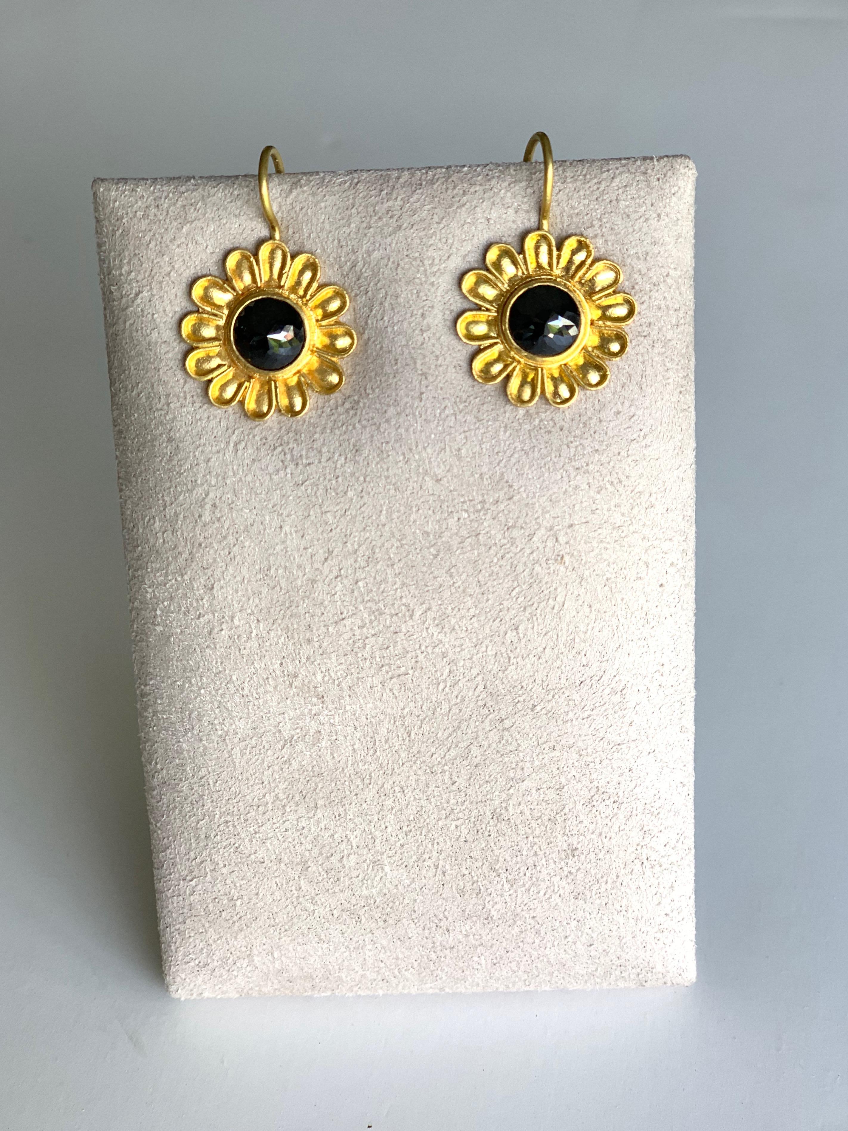 7 Millimeter rose cut black Diamond earringsin 22 Karat gold repoussé and 20 Karat earwires.
These lovely earrings are super comfortable to wear and can easily go from morning to evening. 
They are reminiscent of ancient greek gold jewelry of the