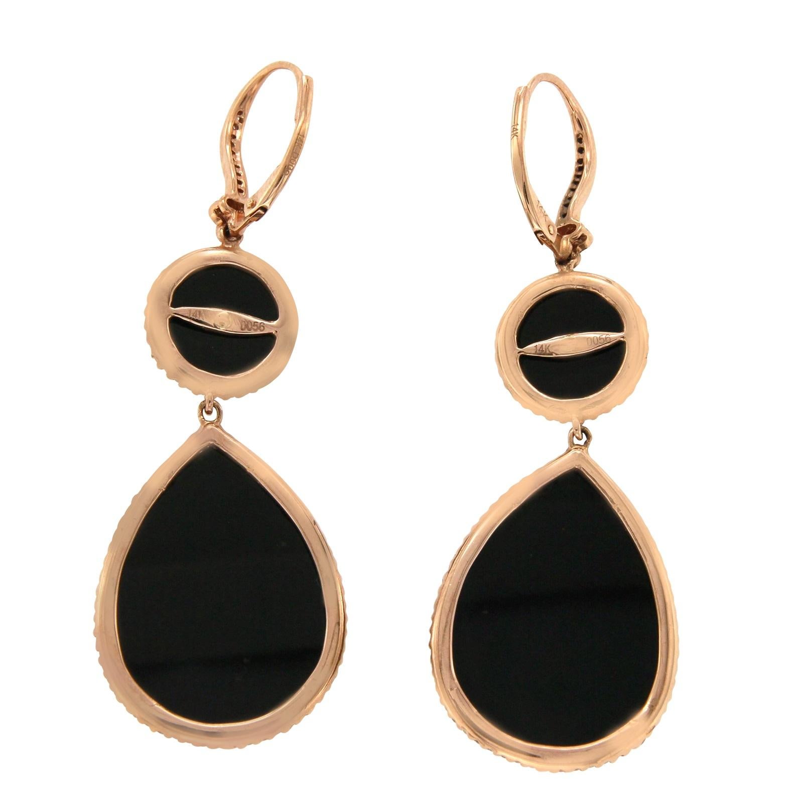 Type: Earrings
Height: 54.4 mm
Width: 19.5 mm
Metal: Rose Gold
Metal Purity: 14K
Hallmarks: 14K
Total Weight:11.1 Grams
Stone Type: 28 CT Black Onyx and 0.56 CT I I1 Diamonds
Condition: New
Stock Number: NP1