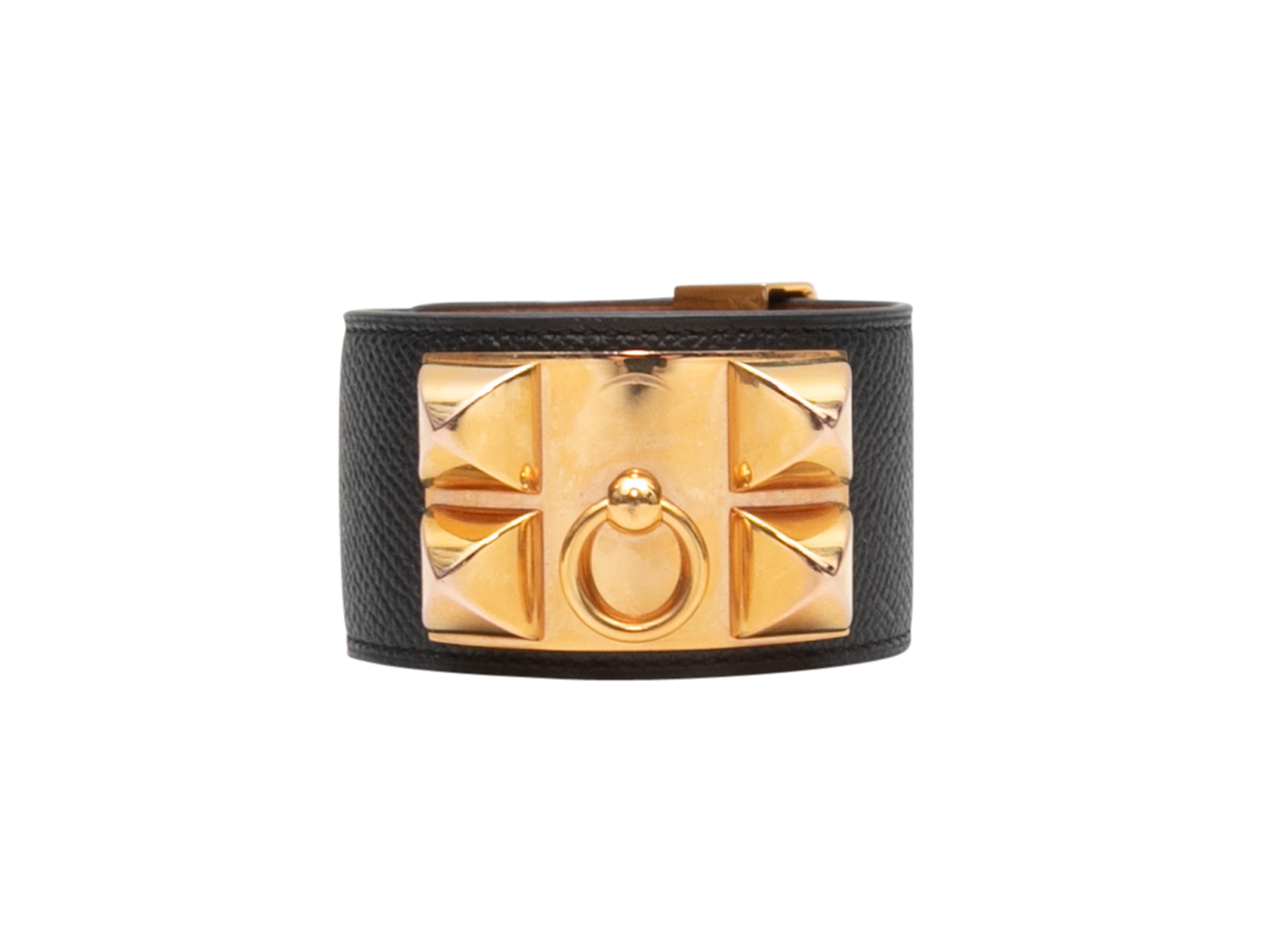 Black leather and rose gold metal Medor large cuff bracelet by Hermes. 1.5
