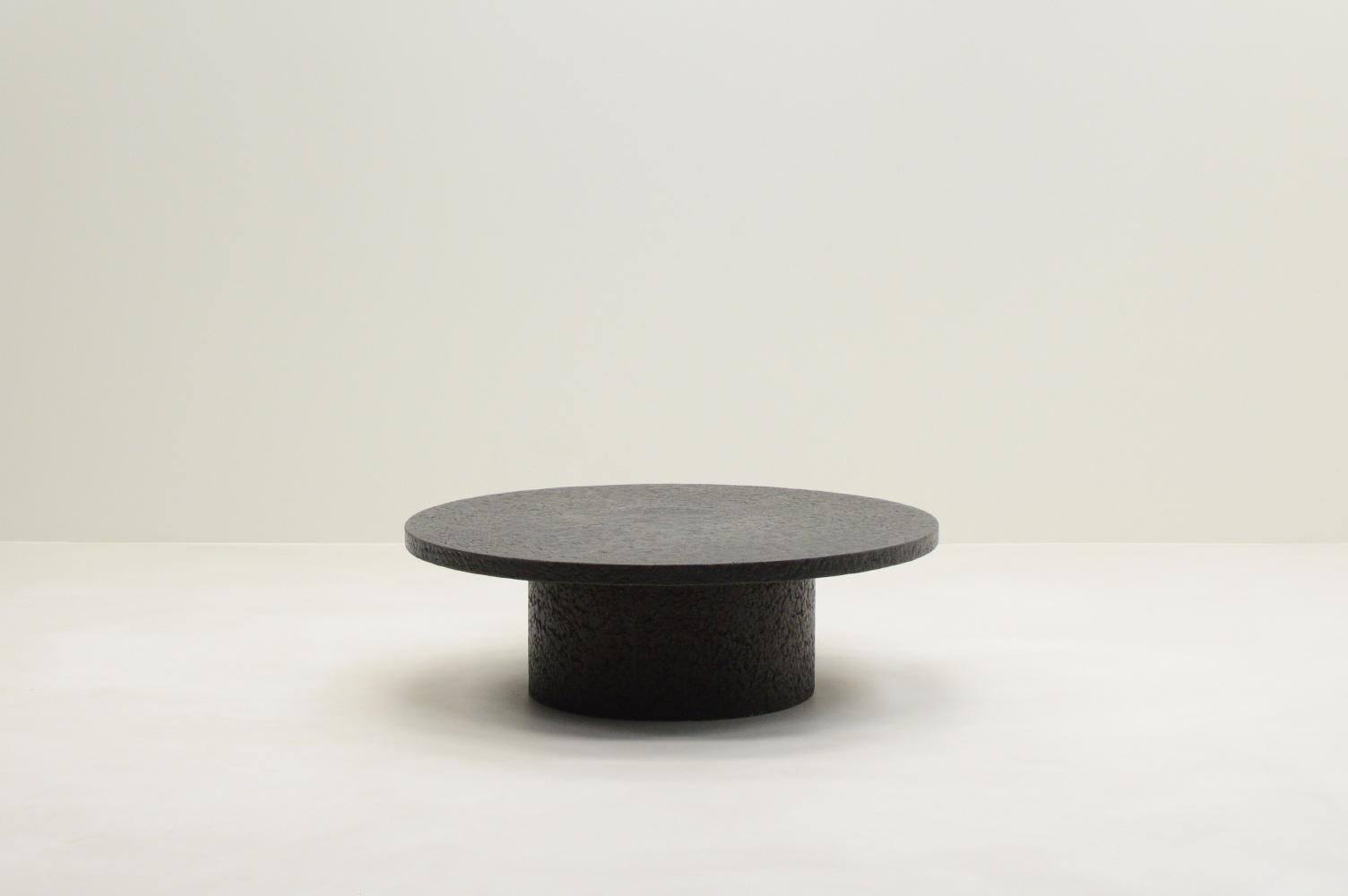 Black brutalist stone resin coffee table, 70’s Netherlands. Impressive table made from a mixture of stone and resin, but looks completely stone. This gives a beautiful pattern and makes the table lighter. The base and top are in one piece. In great