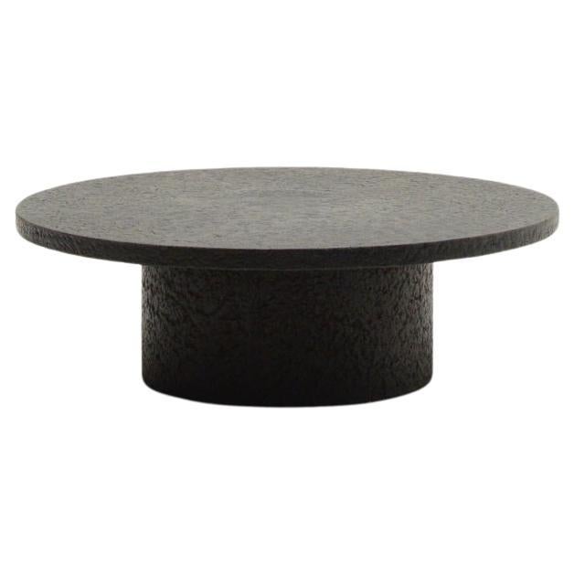 Black round brutalist stone resin coffee table, 70’s Netherlands.