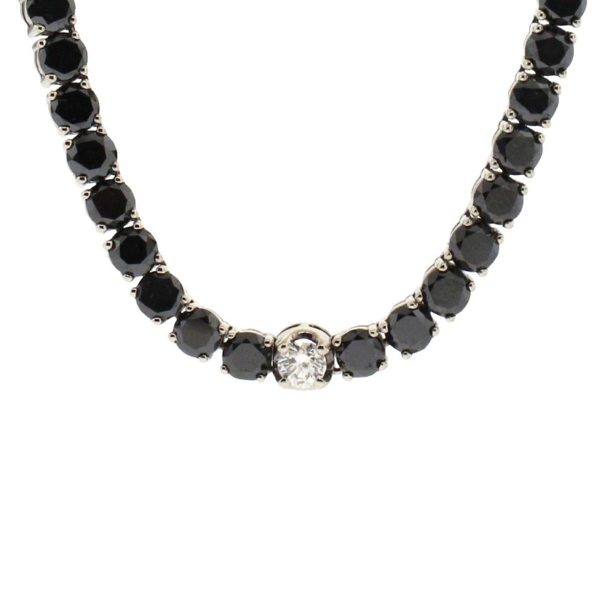 14k White Gold Black Round Diamond Tennis Necklace

Company: N/A

Style of jewelry: Black & White Diamond Tennis Necklace

Material: 14k white gold

Stones: Approximately 2ctw of Round cut Diamonds and approximately 33ctw of round cut black