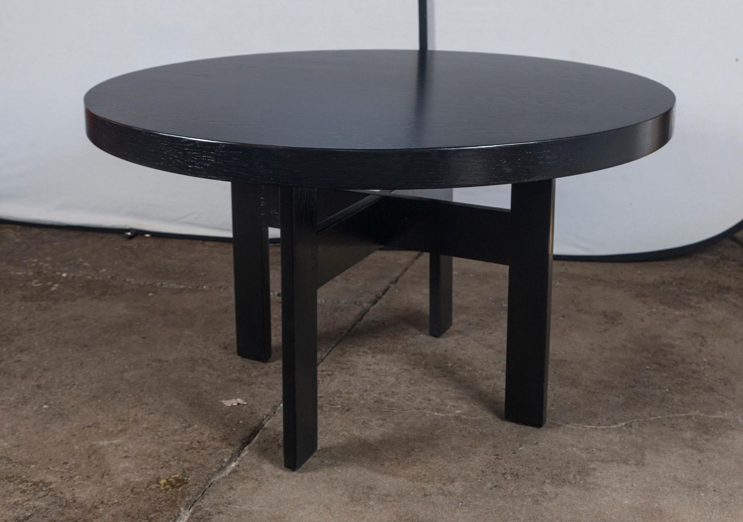 Black round oak ebonized table.