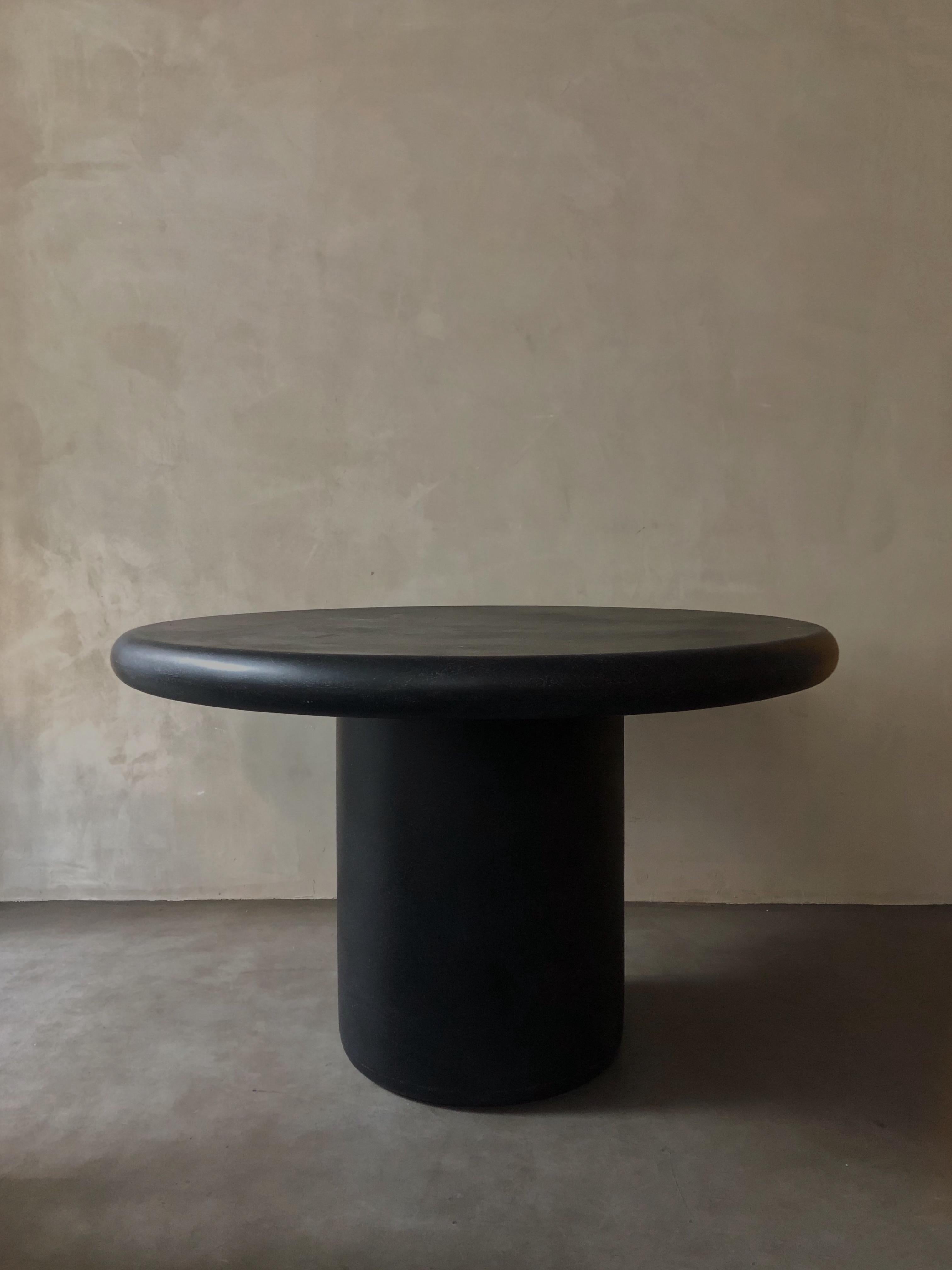 Black round table by Karstudio
Materials: FRP
Dimensions: 120 x 74 cm

This piece is suitable for outdoor use.
Available in black or white. 

A combination of smooth and steady, a good adaptation to various interior style.

Kar- is the root