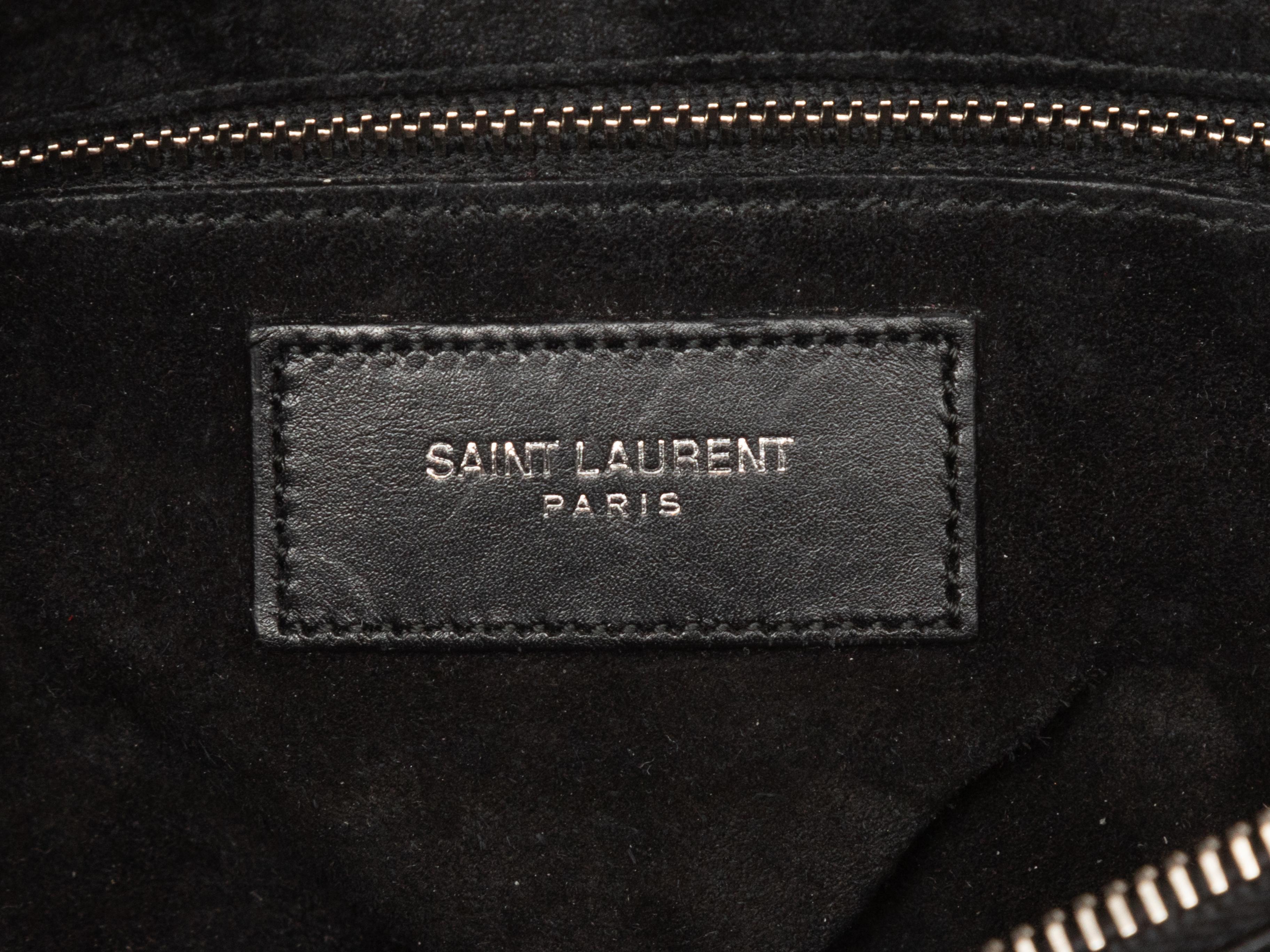 Black Saint Laurent Studded Leather Satchel. This satchel features a leather body, silver-tone hardware, dual rolled top handles, and a top zip closure. 12.5