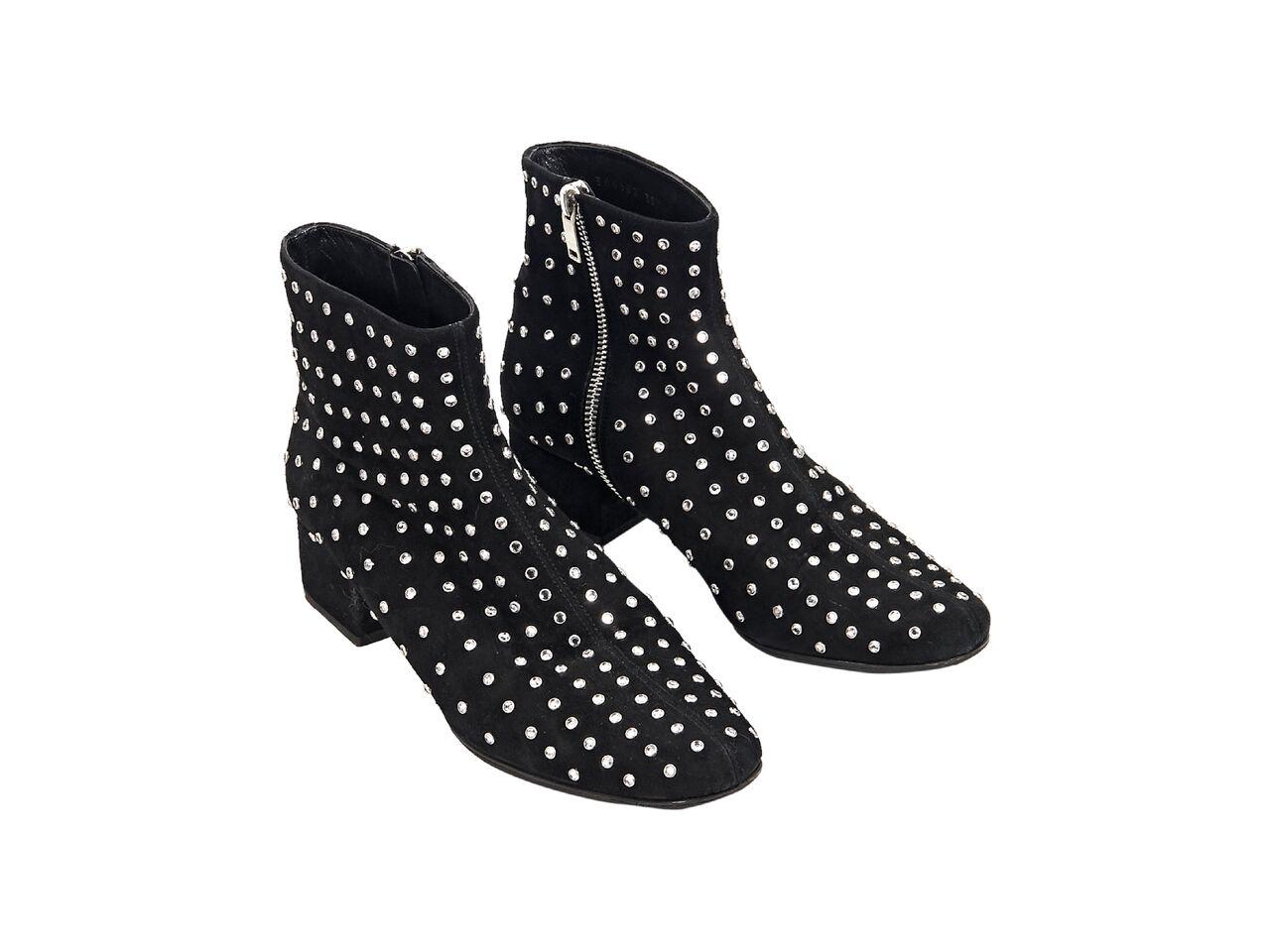 Product details:  Black studded suede ankle boots by Saint Laurent.  Inner zip closure.  Round toe.  Silvertone hardware.  1.5