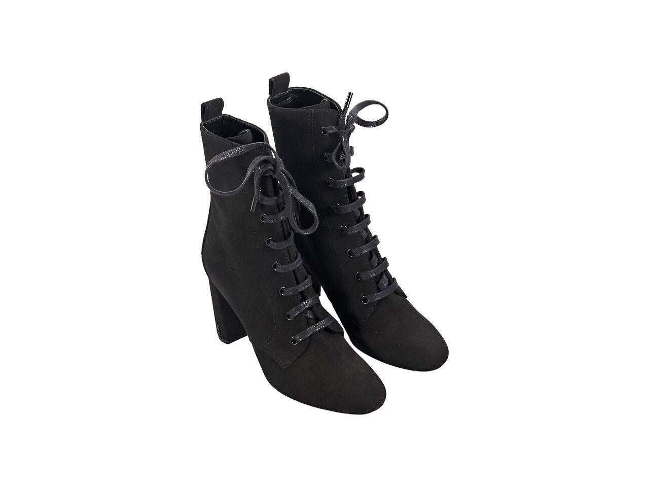 Product details:  Black suede ankle boots by Saint Laurent.  Lace-up front closure.  Round toe.  4