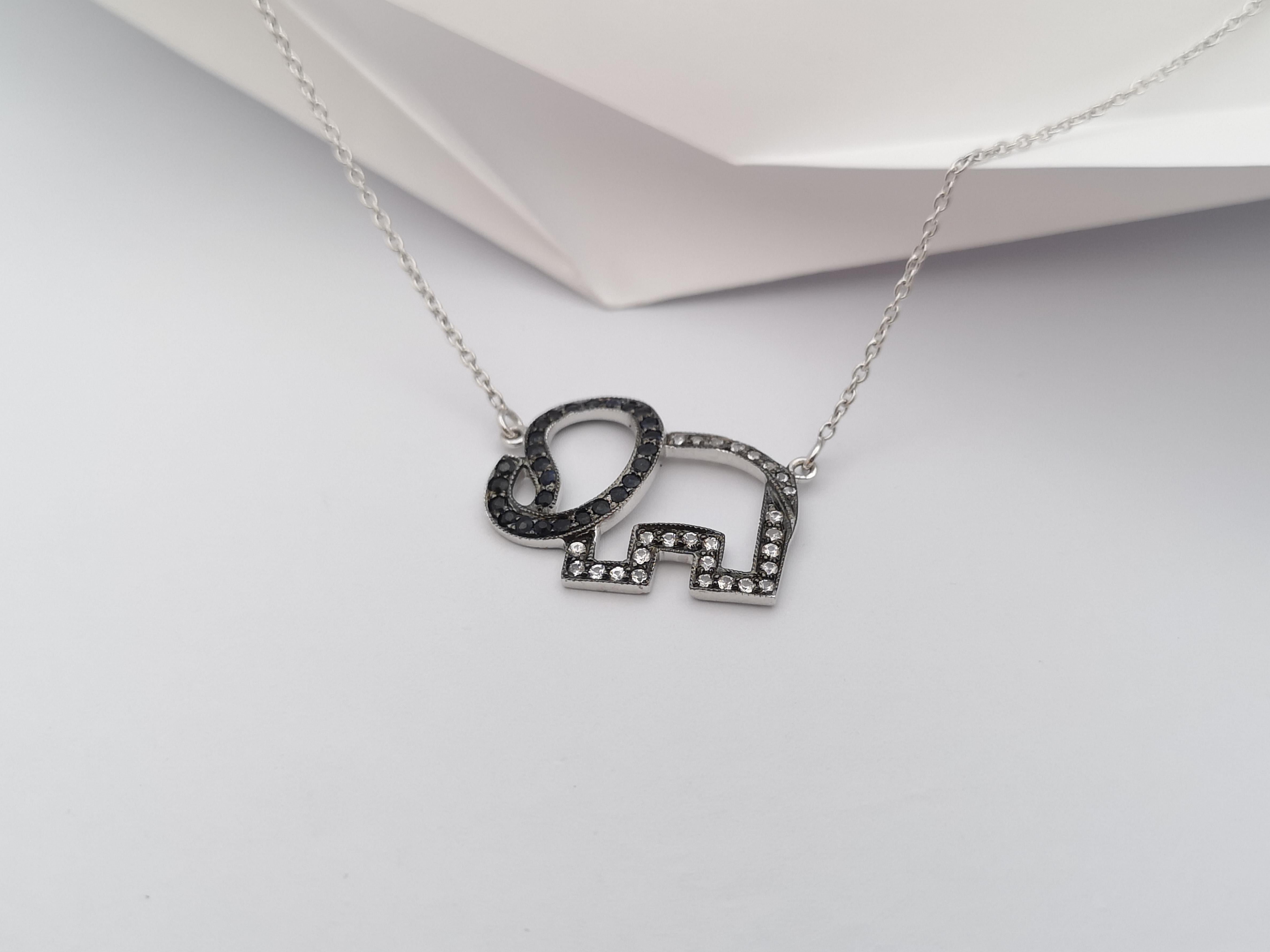 Black Sapphire and White Sapphire Necklace set in Silver Settings

Width:  1.9 cm 
Length:  46.0 cm
Total Weight: 3.42 grams

*Please note that the silver setting is plated with rhodium to promote shine and help prevent oxidation.  However, with the