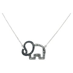 Used Black Sapphire and White Sapphire Elephant Necklace set in Silver Settings