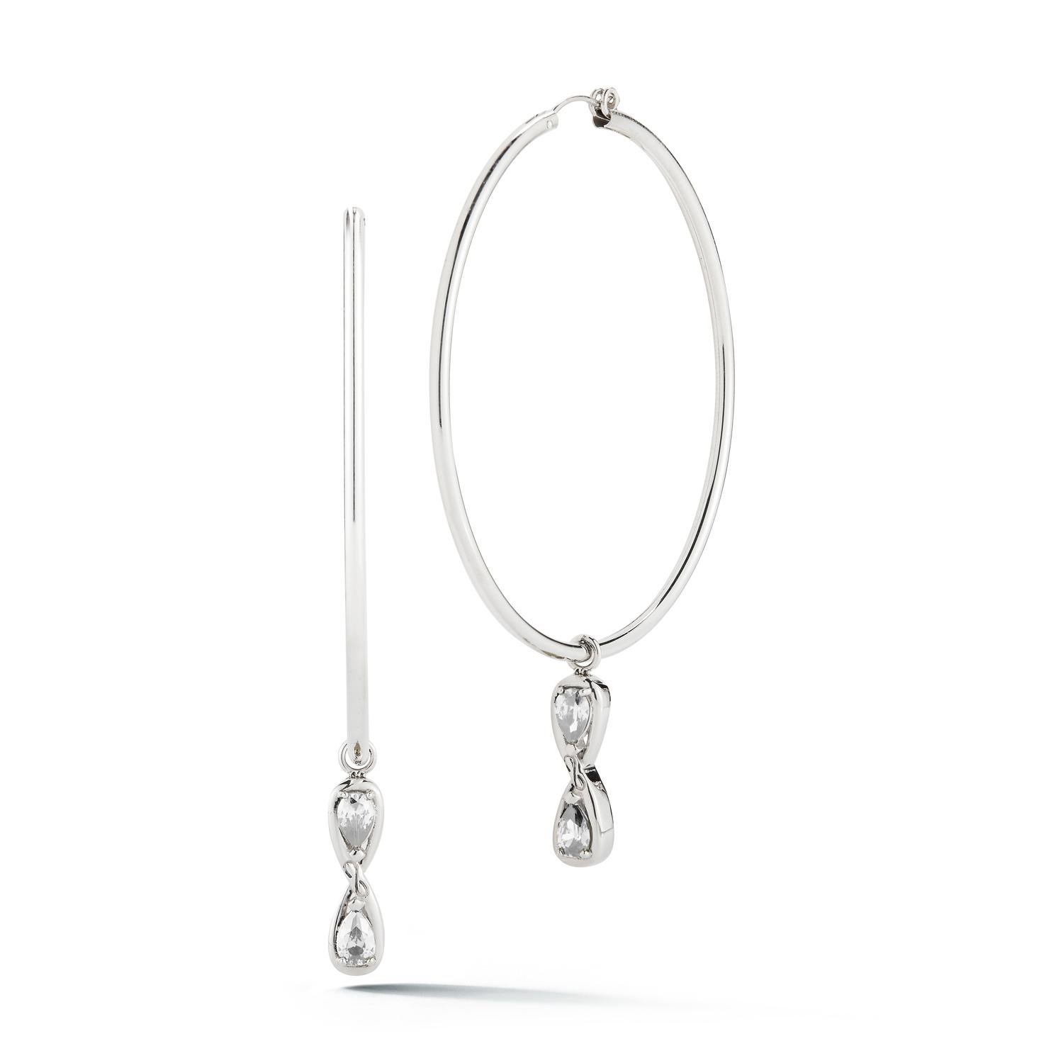 Designed in NYC

.925 Sterling Silver 6 x 4 mm Black Sapphire Infinity Stone Dangle Hoops. When it comes to self-expression, the style possibilities are endless. Infinity stone dangle hoops:

Sterling silver 
High-polish finish
Light-weight 
Light